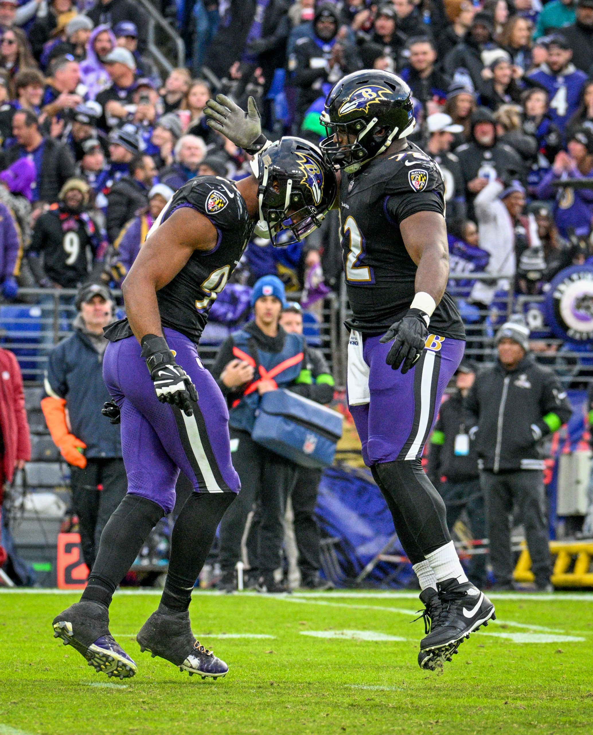 Baltimore Ravens Odafe Oweh, left, and Justin Madubuike celebrate after...