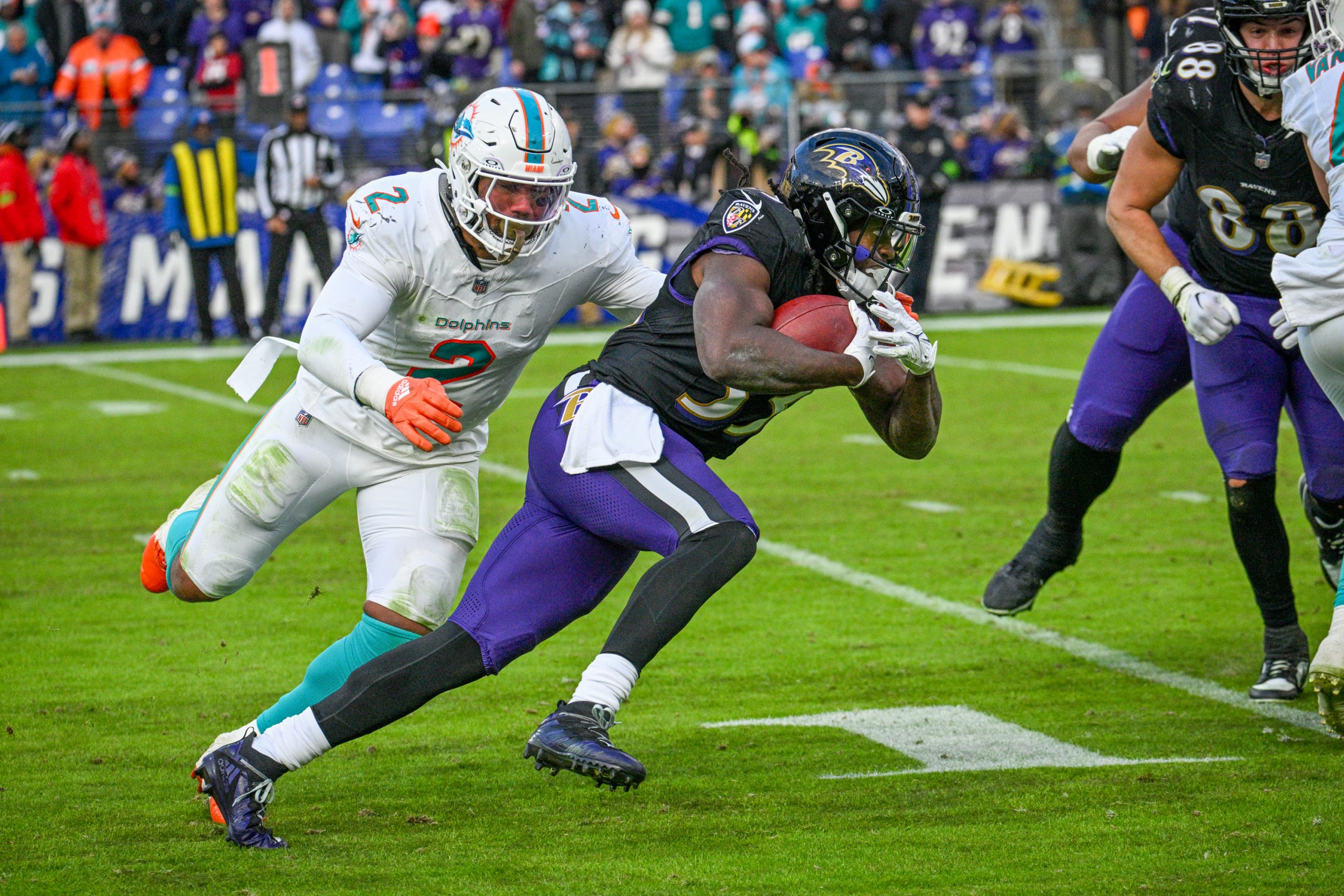 Baltimore Ravens Melvin Gordon III runs for a gain in...