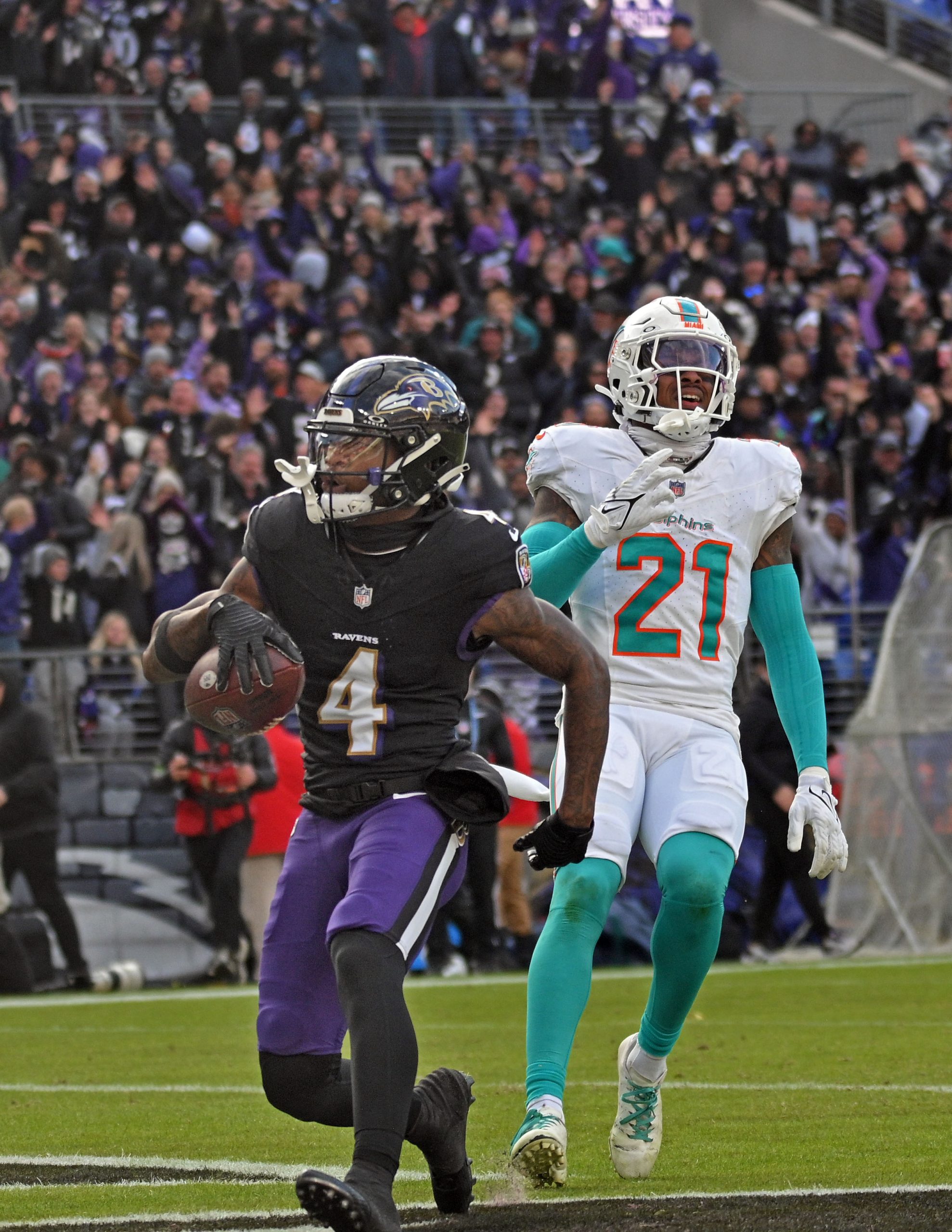 Baltimore Ravens wide receiver Zay Flowers scores a 75-yards touchdown...