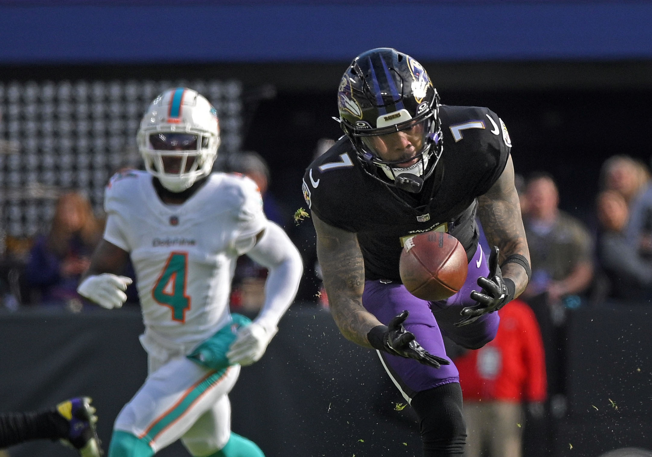 Baltimore Ravens wide receiver Rashod Bateman catches a deep pass...