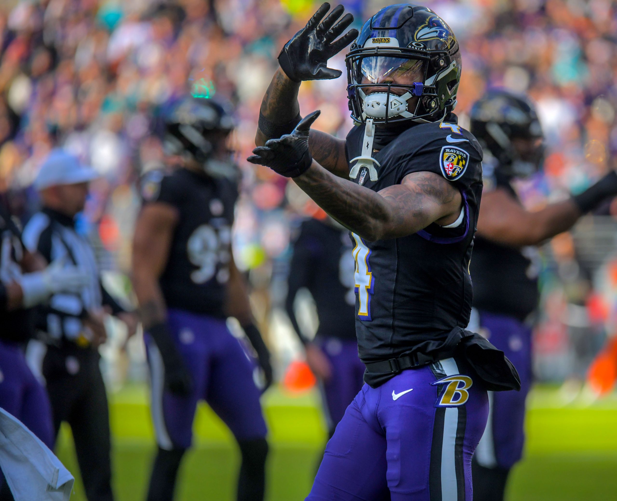 Baltimore Ravens wide receiver Zay Flowers reacts after a touchdown...