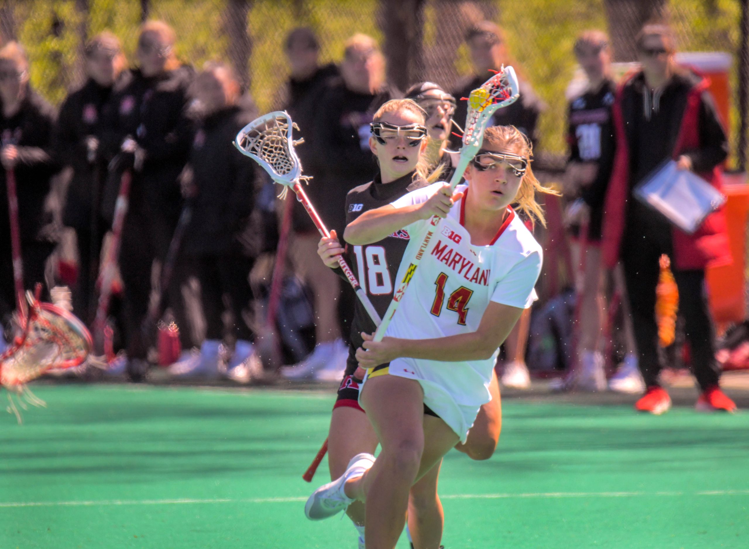 Rutgers Scarlet Knights midfielder Reese Robinson watches Maryland Terrapins midfielder...