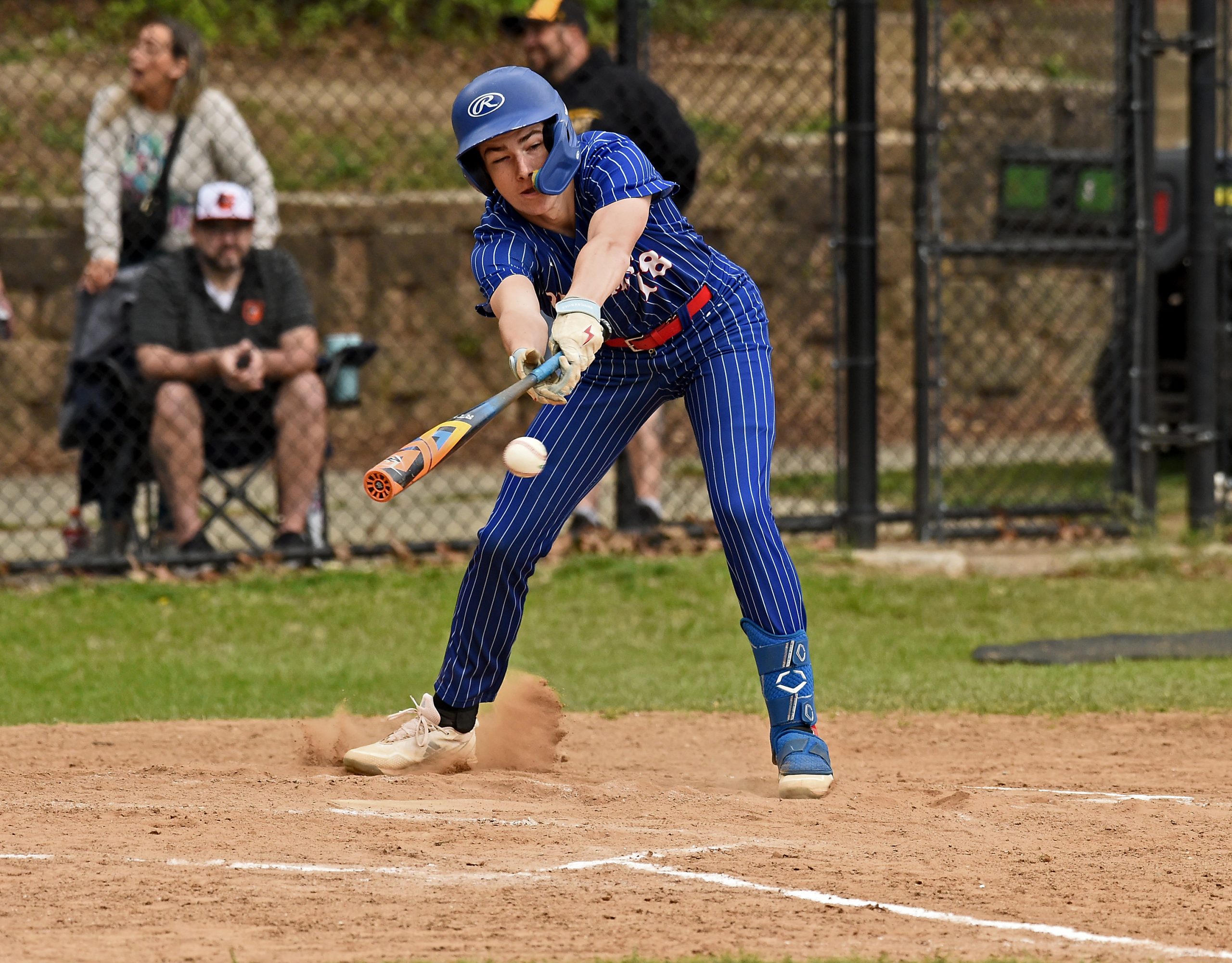 Old Mill’s Brandon Rzepkowski singles in the second inning. The...