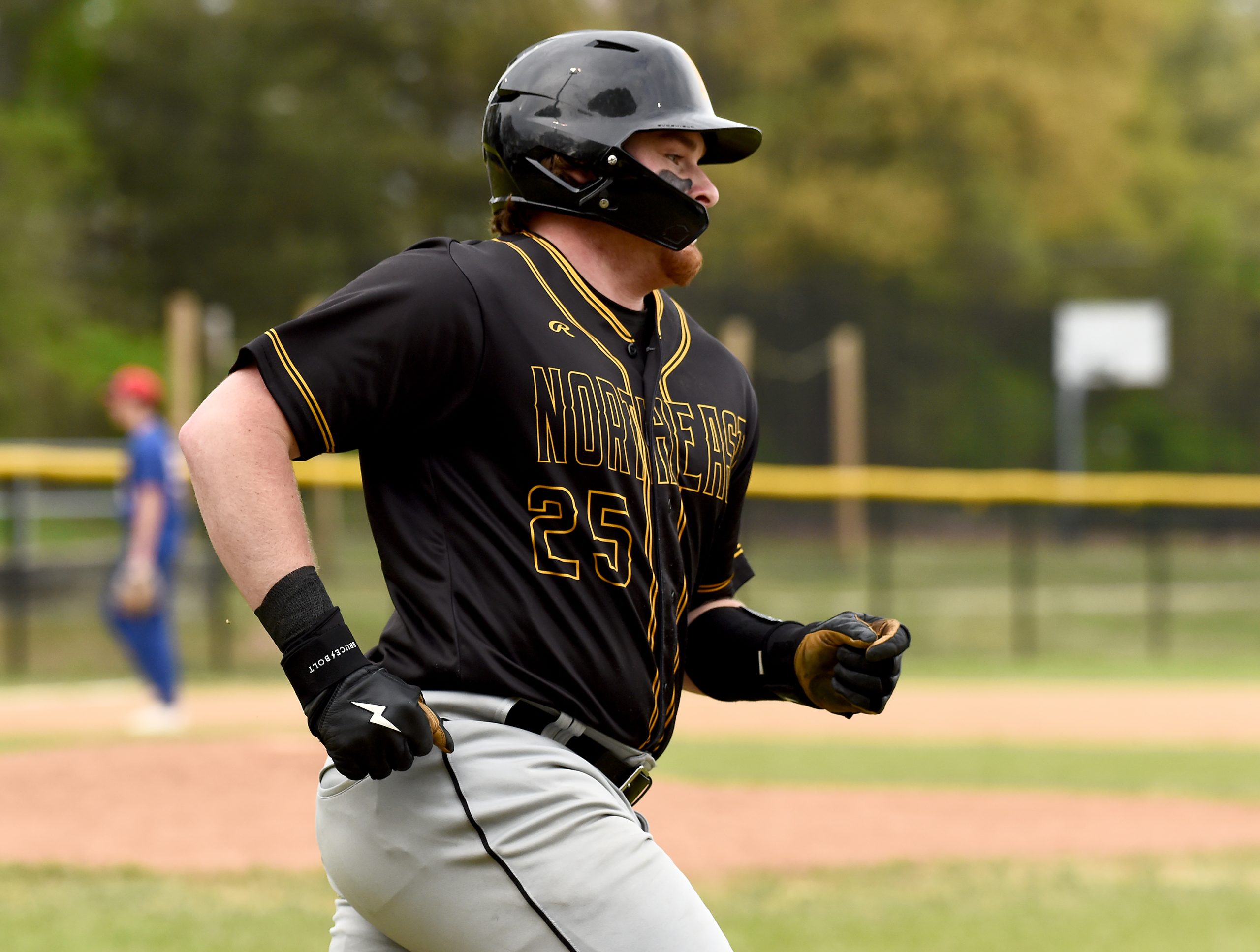 Northeast’s Dakota Patton hits a single in the second inning....