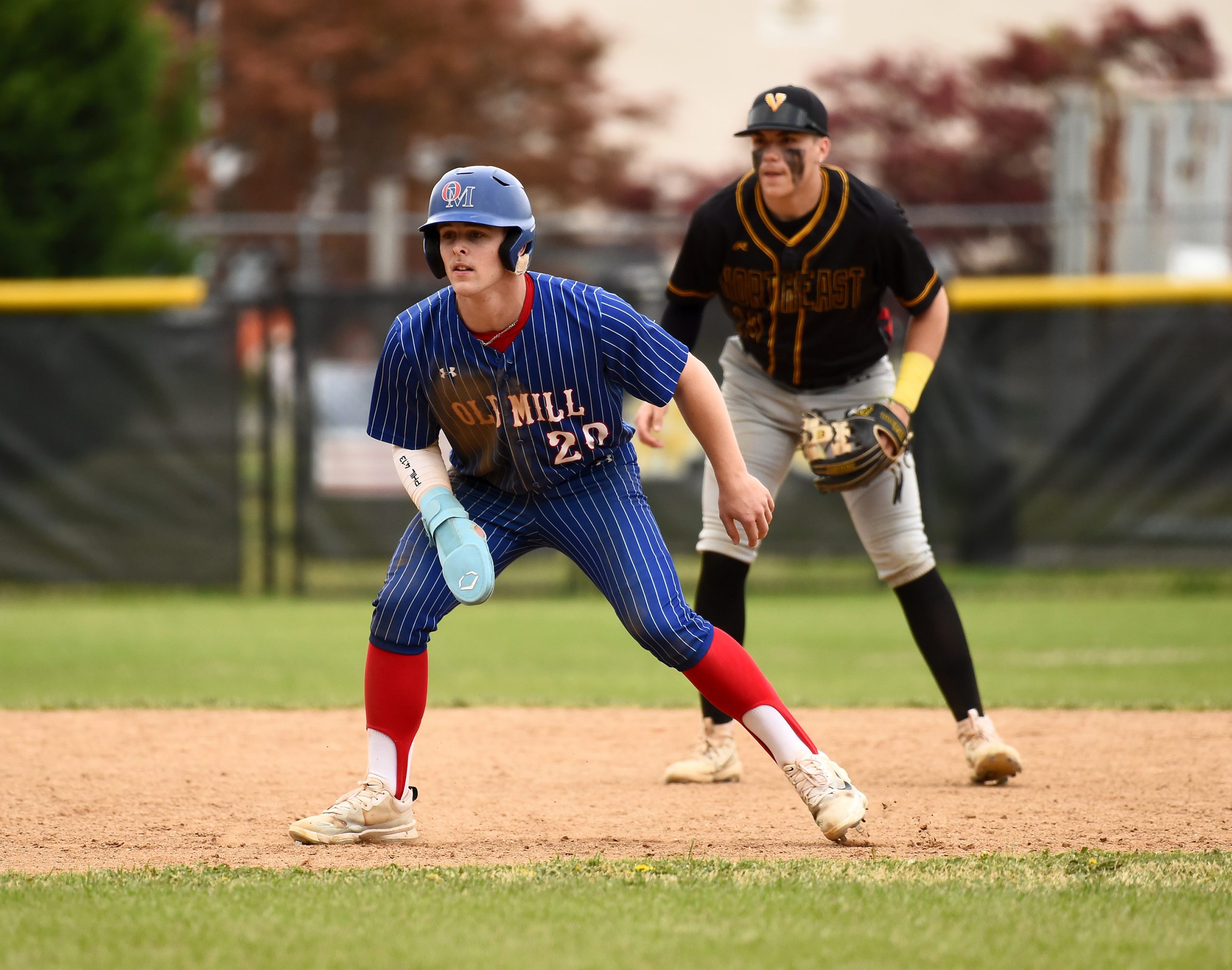 Old Mill’s Calen Witcher takes a lead at second base...