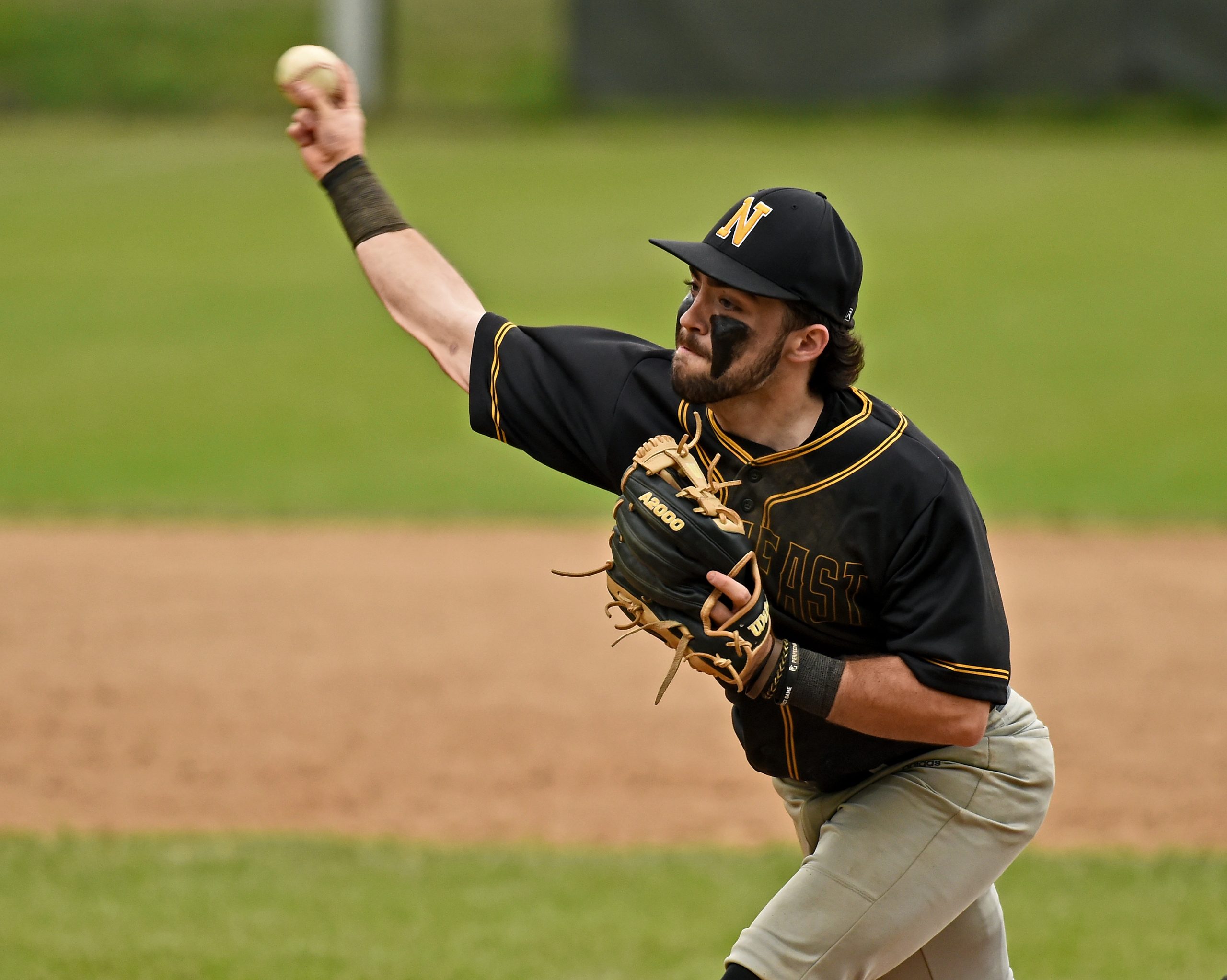 Northeast pitcher Mike Kooser throws in the sixth inning. The...