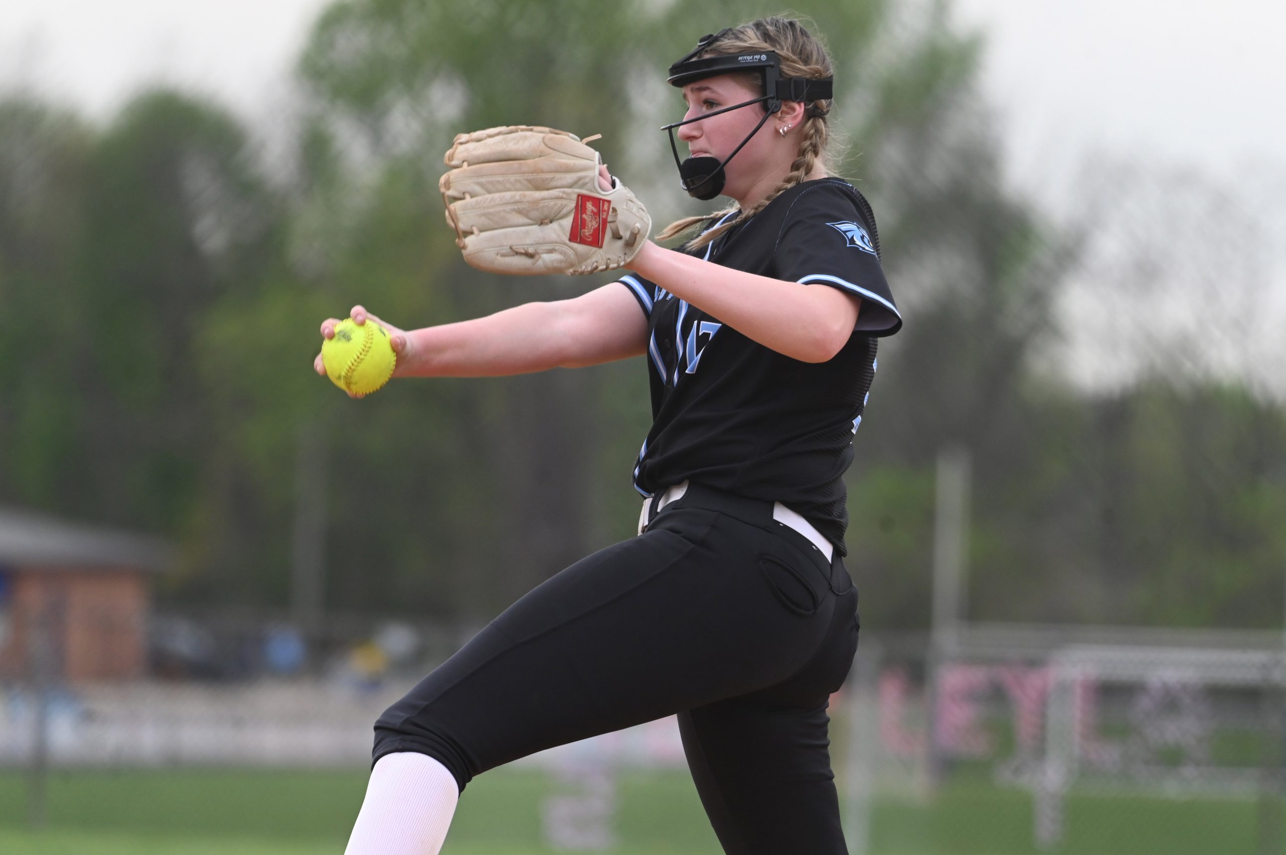 Westminster pitcher Lila Moxley delivers to a Liberty batter during...