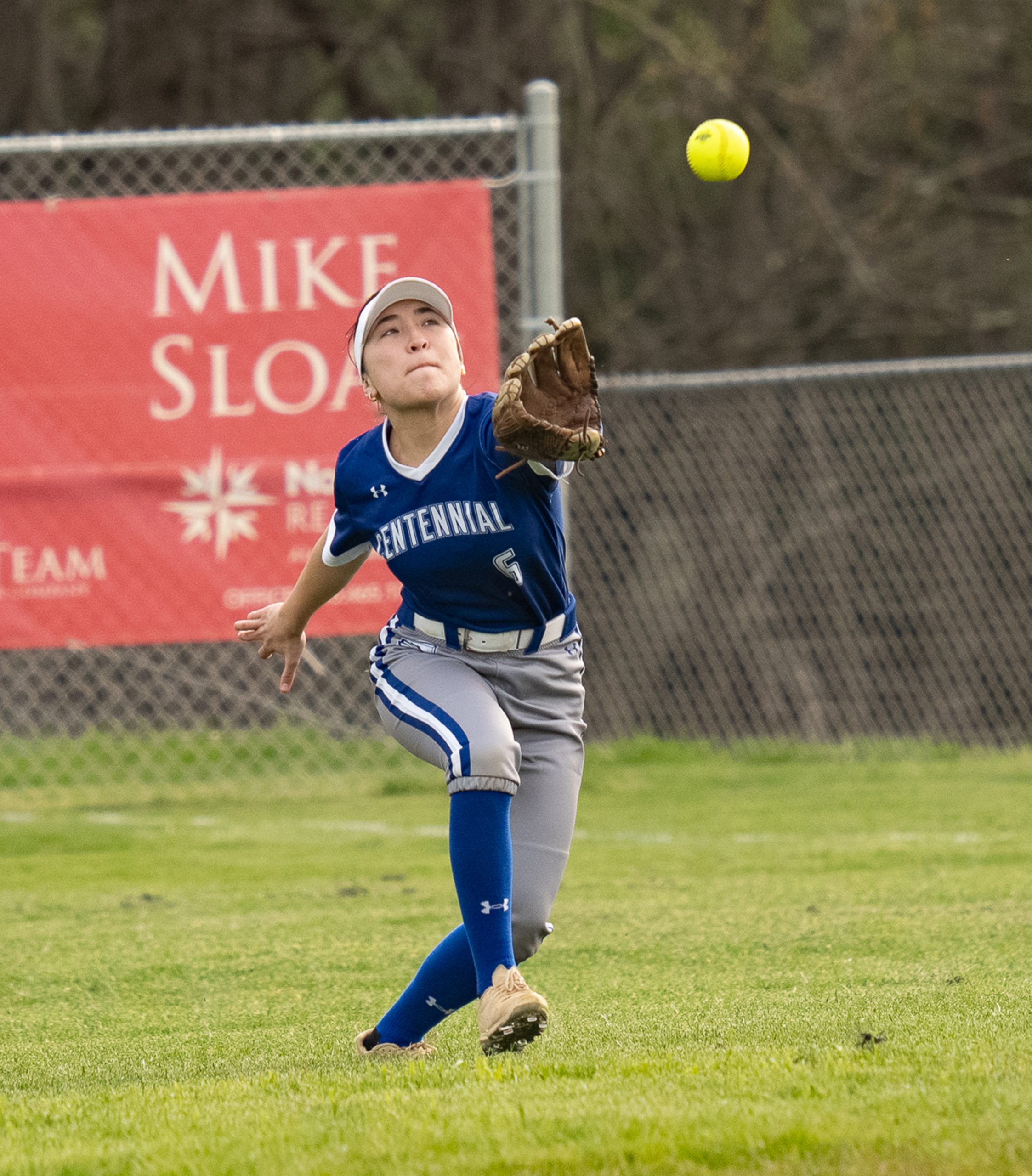 April 8, 2024 Centennial right fielder #6, Abiola Owens, races...