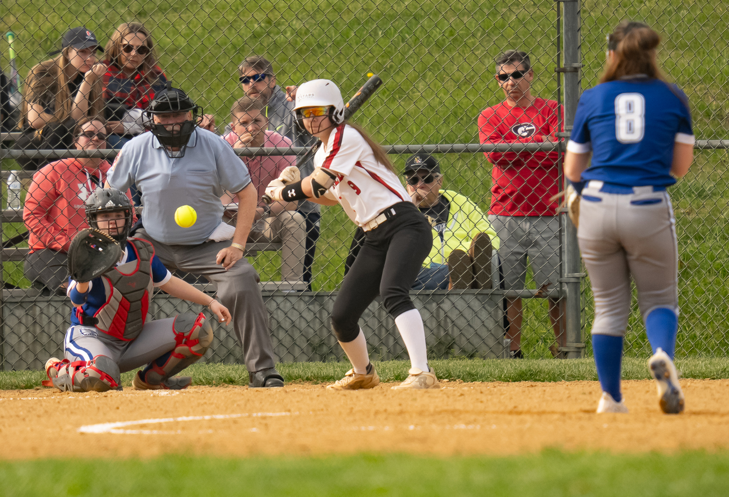 April 8, 2024 Centennial pitcher #8, Nicole Cavey, paints the...