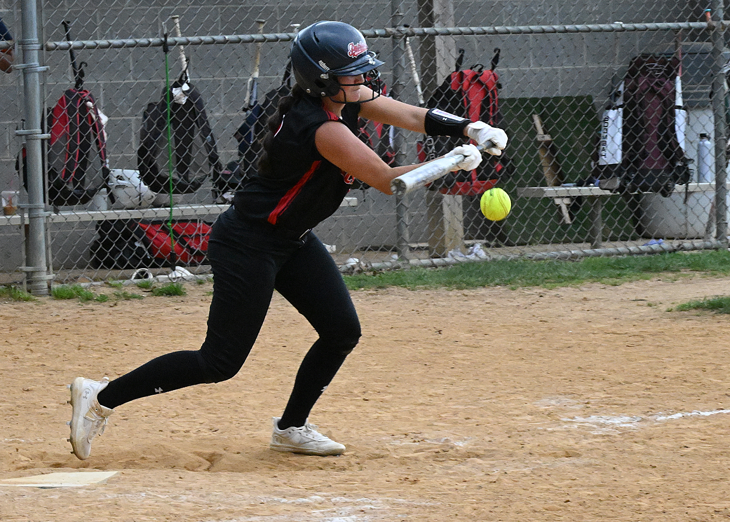 Glenelg #13 Addi Pence lays down a sacrafice bunt to...