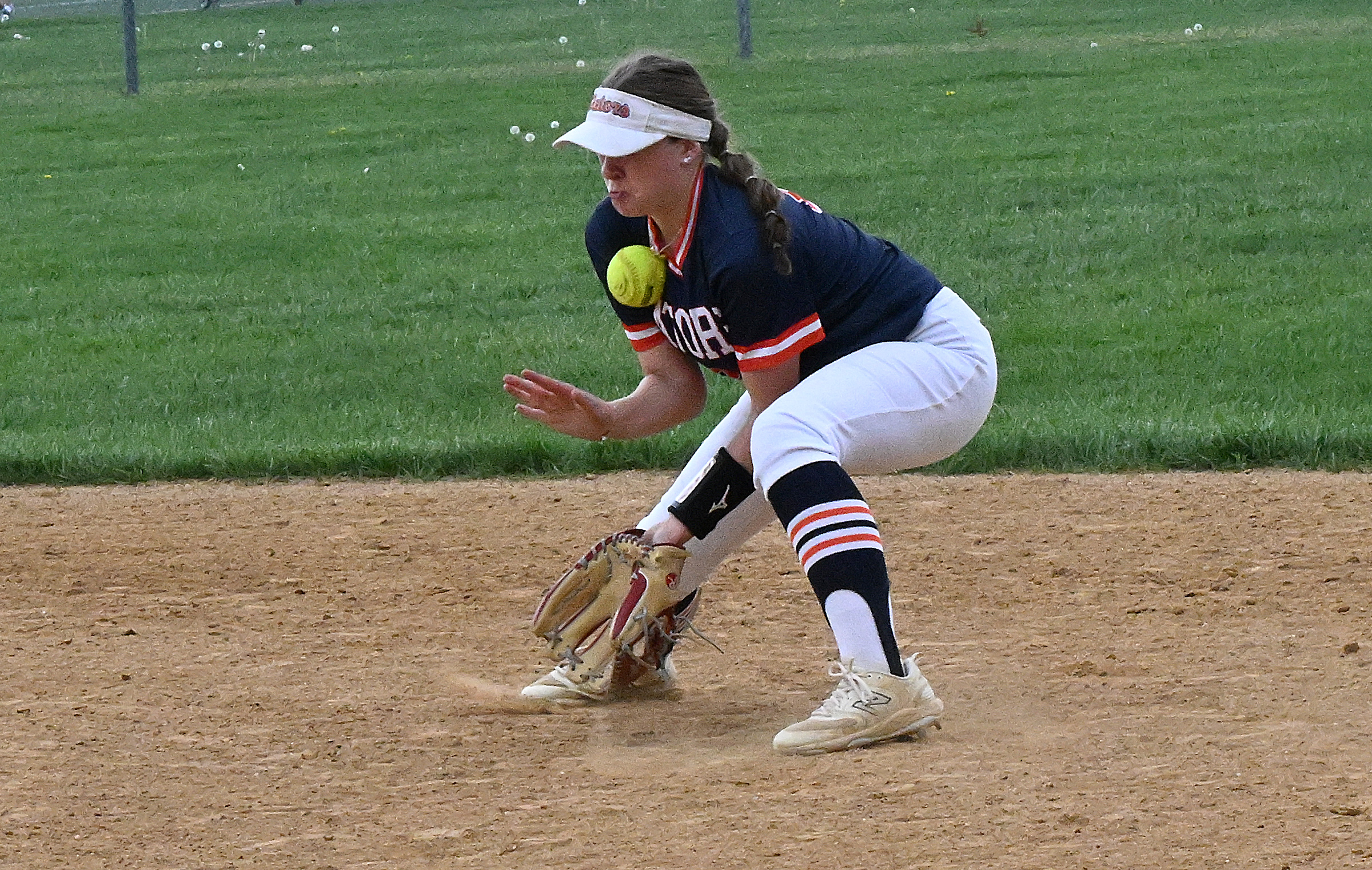 Reservoir 2nd baseman #22 Catherine Yourishin takes a shot on...