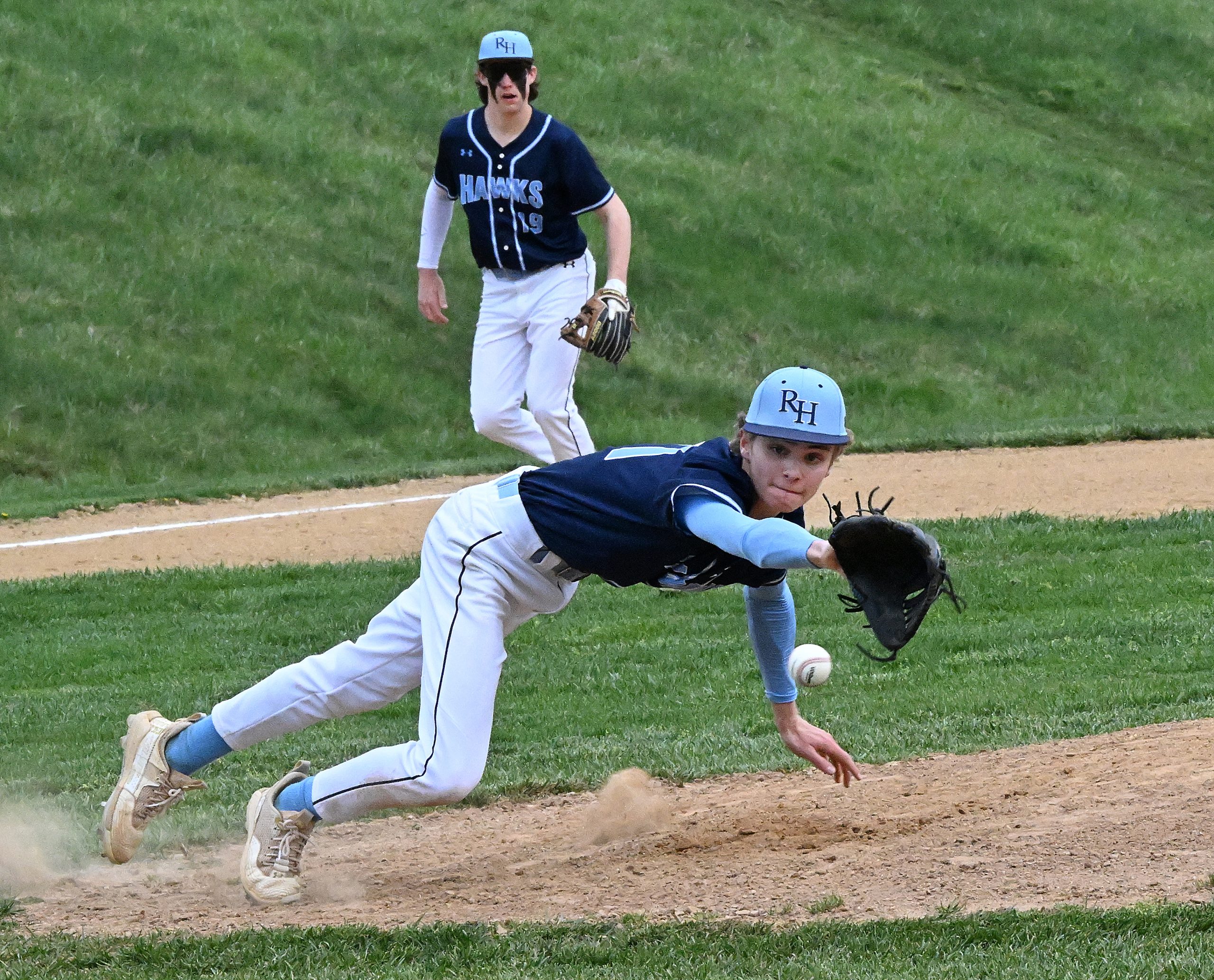 River Hill starting pitcher #11, Thomas Jayne tries to make...