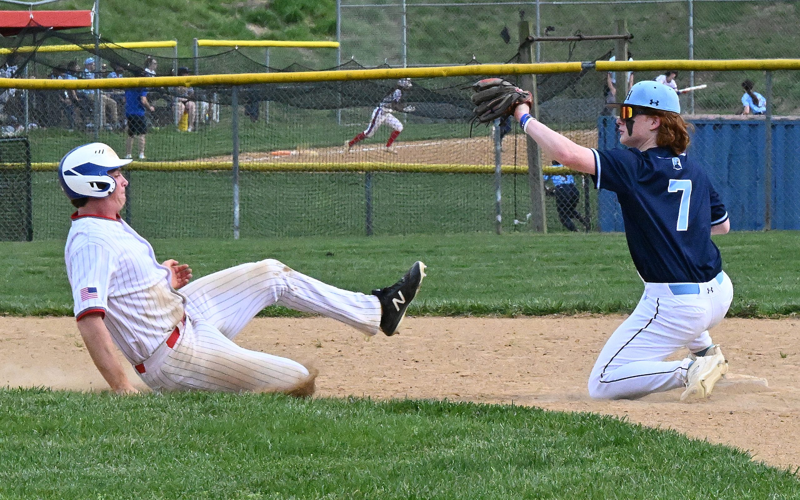 River Hill 3rd baseman #19, Ryan Walsh makes a play...