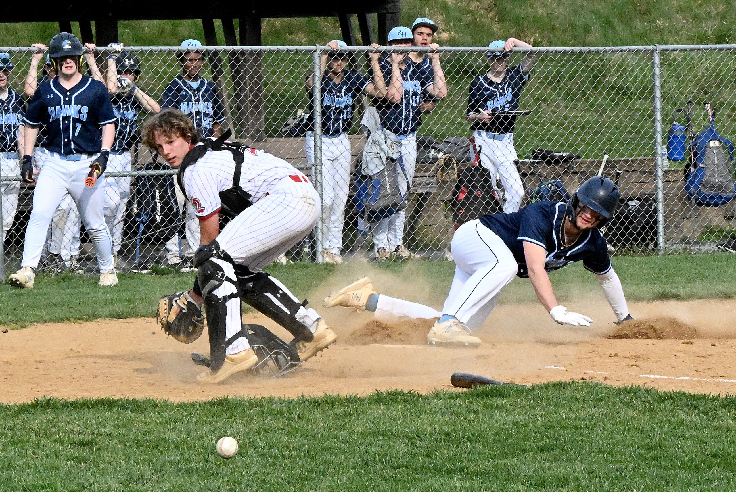 River Hill #9, Henry Zatkowski scores when Centennial catcher #2,...