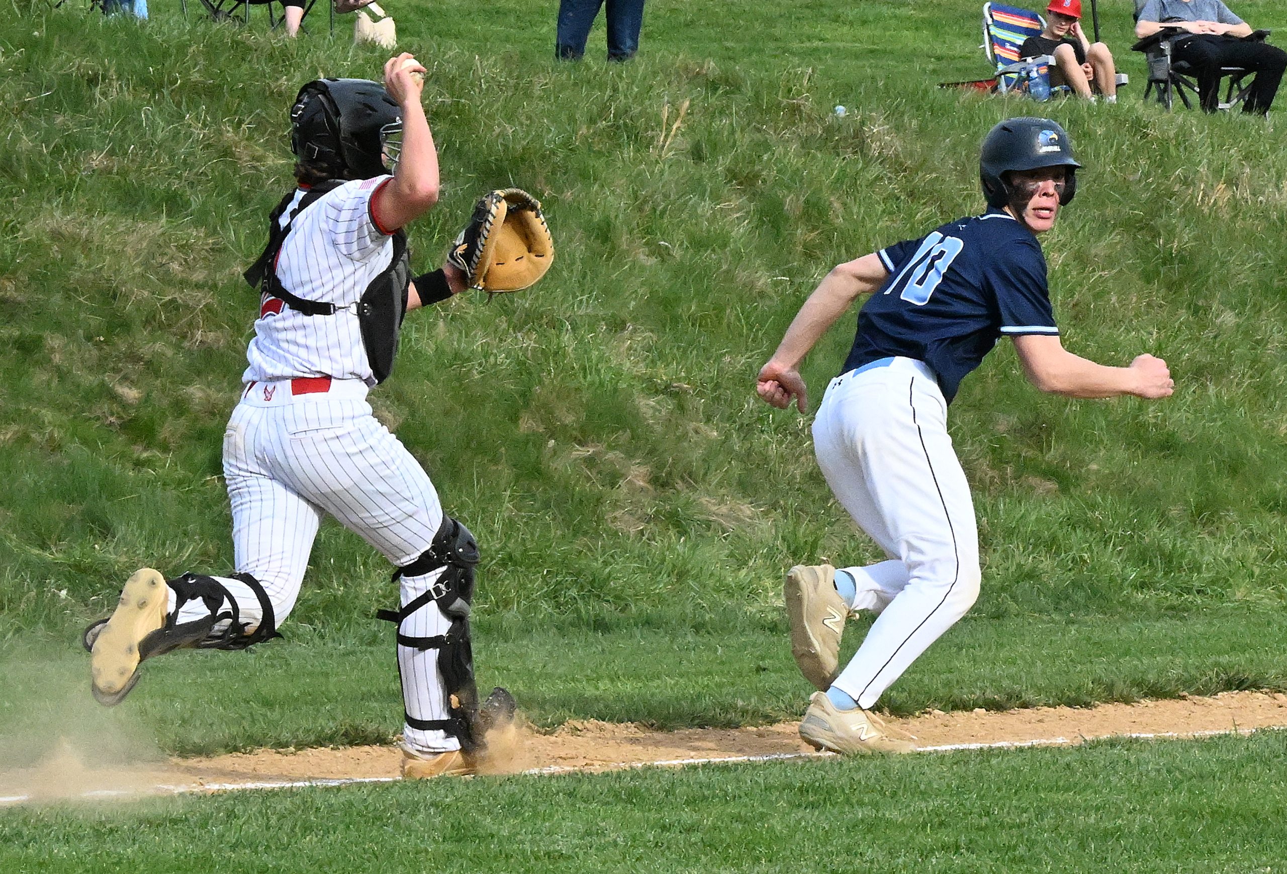 River Hill #10, Anderson Dang gets caught in a run...