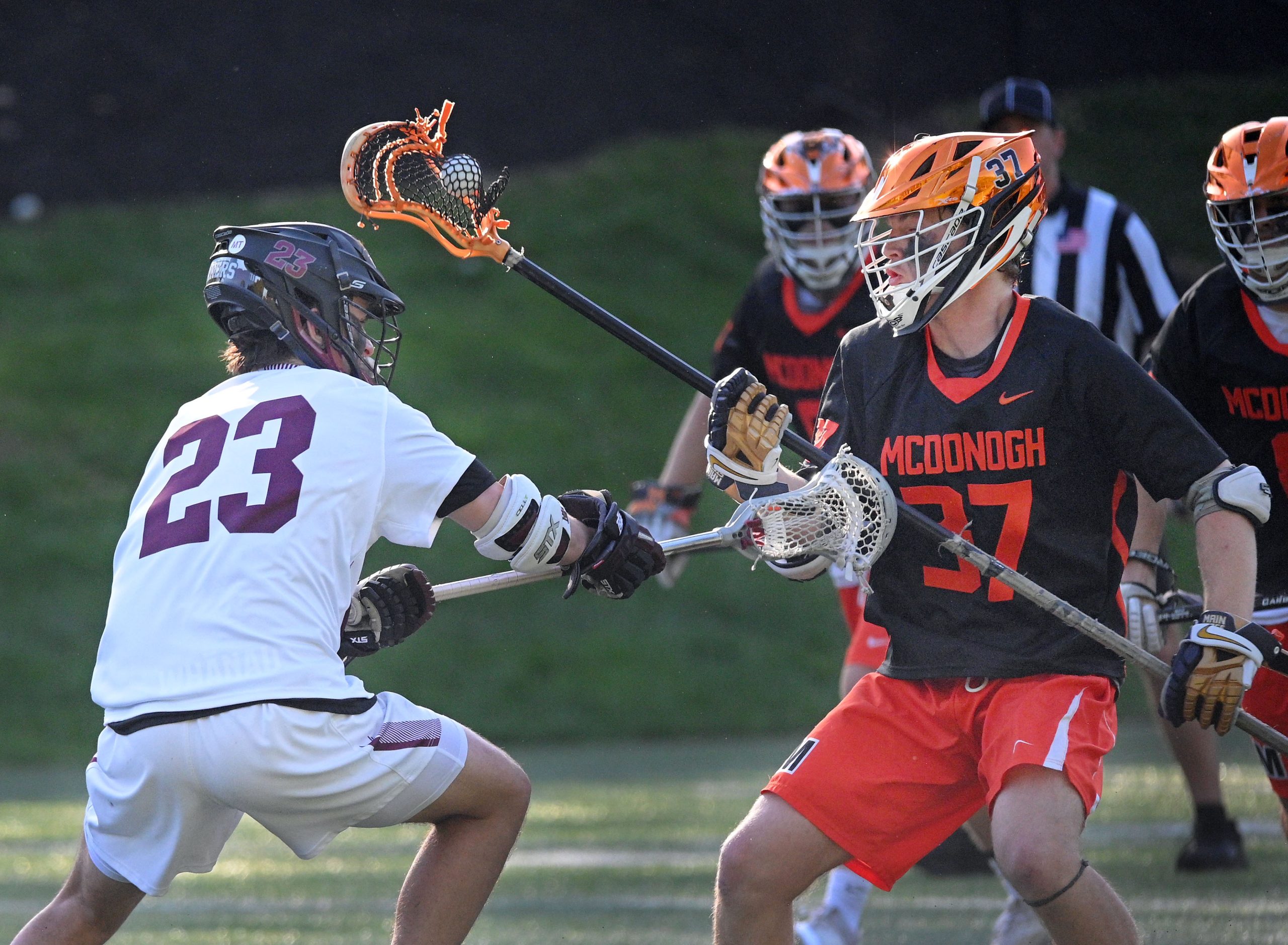 McDonogh’s Hayden Holmes, right, intercepts the ball from Boys’ Latin’s...