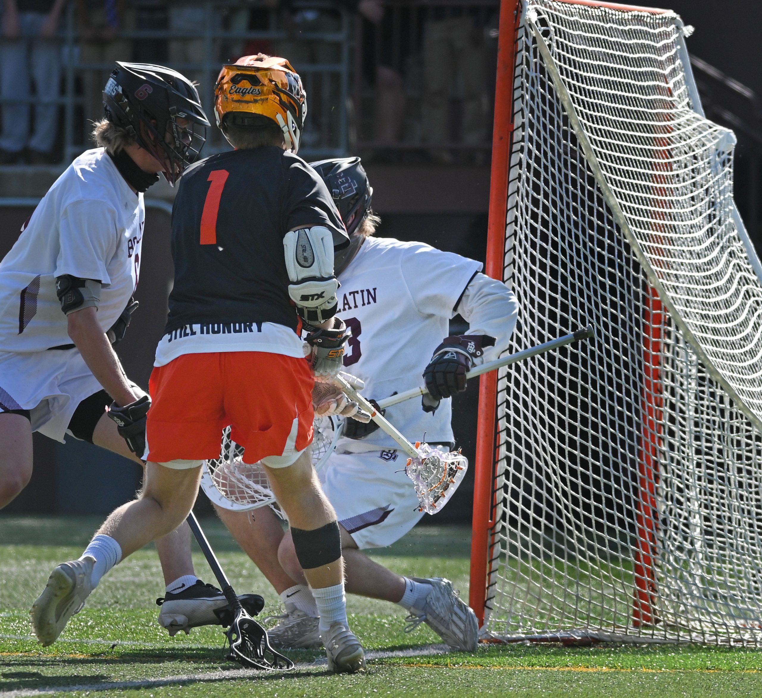 McDonogh’s Luke Miller, center, scores his team’s third goal against...