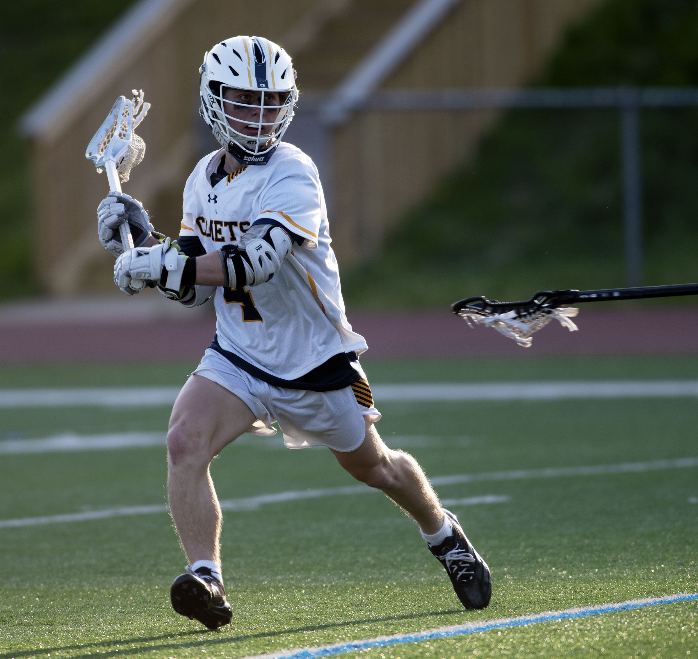 Catonsville’s Toby Eveleth looks to pass against Towson at Catonsville...