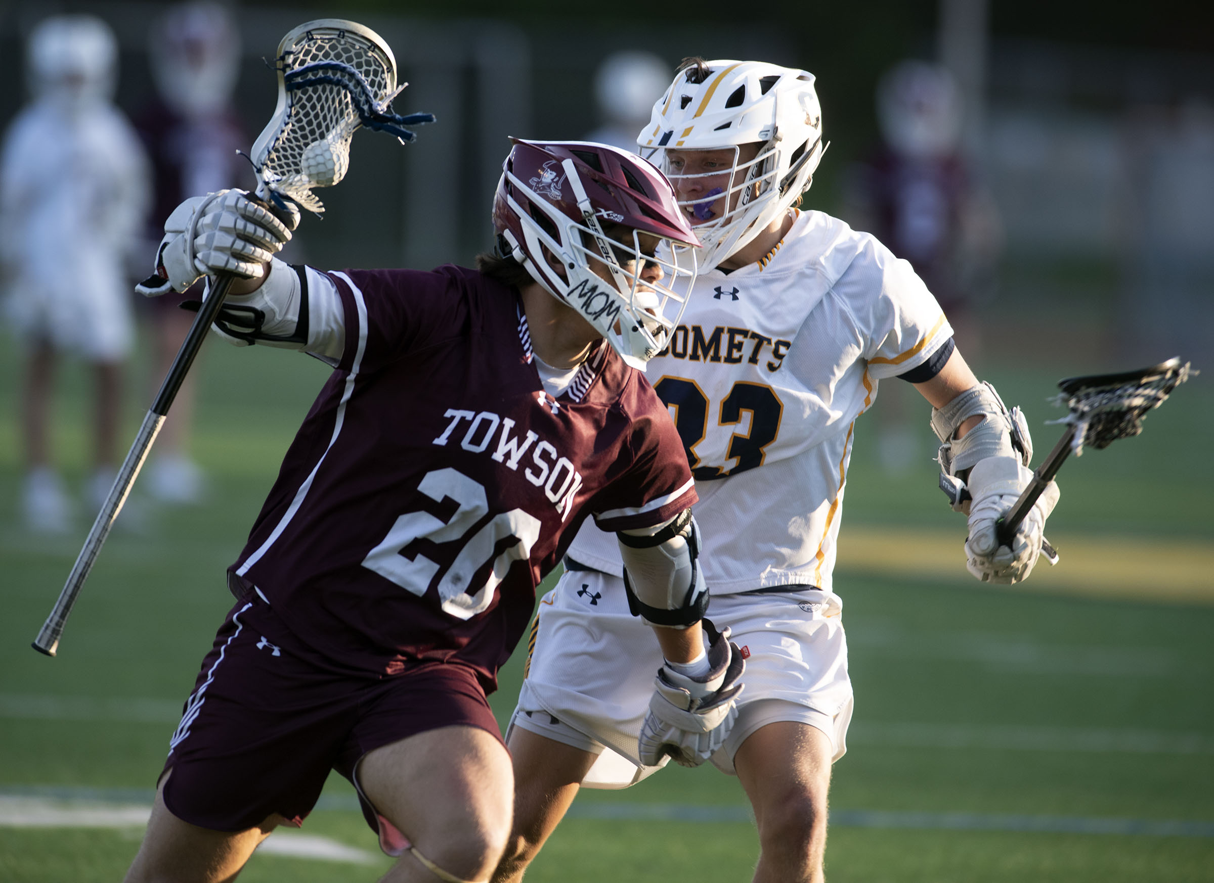Towson’s Ansen Park, left, moves the ball against Catonsville’s Wade...