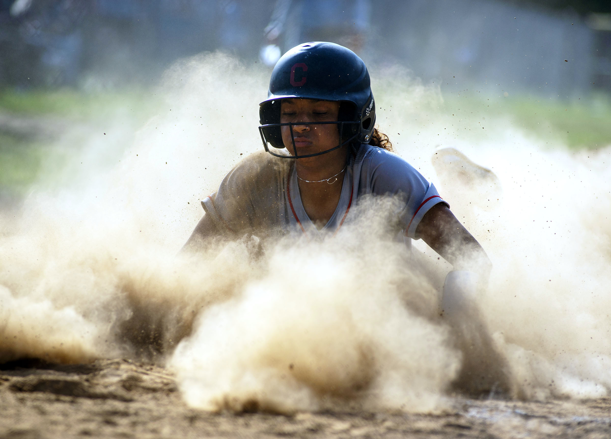 Crofton’s India Stokes slides home to score from third on...