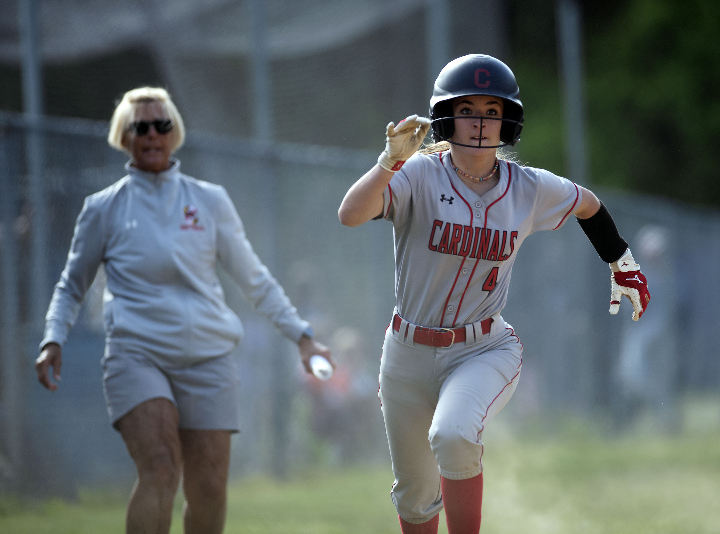 Crofton’s Grace Ackermann races home to score on a triple...