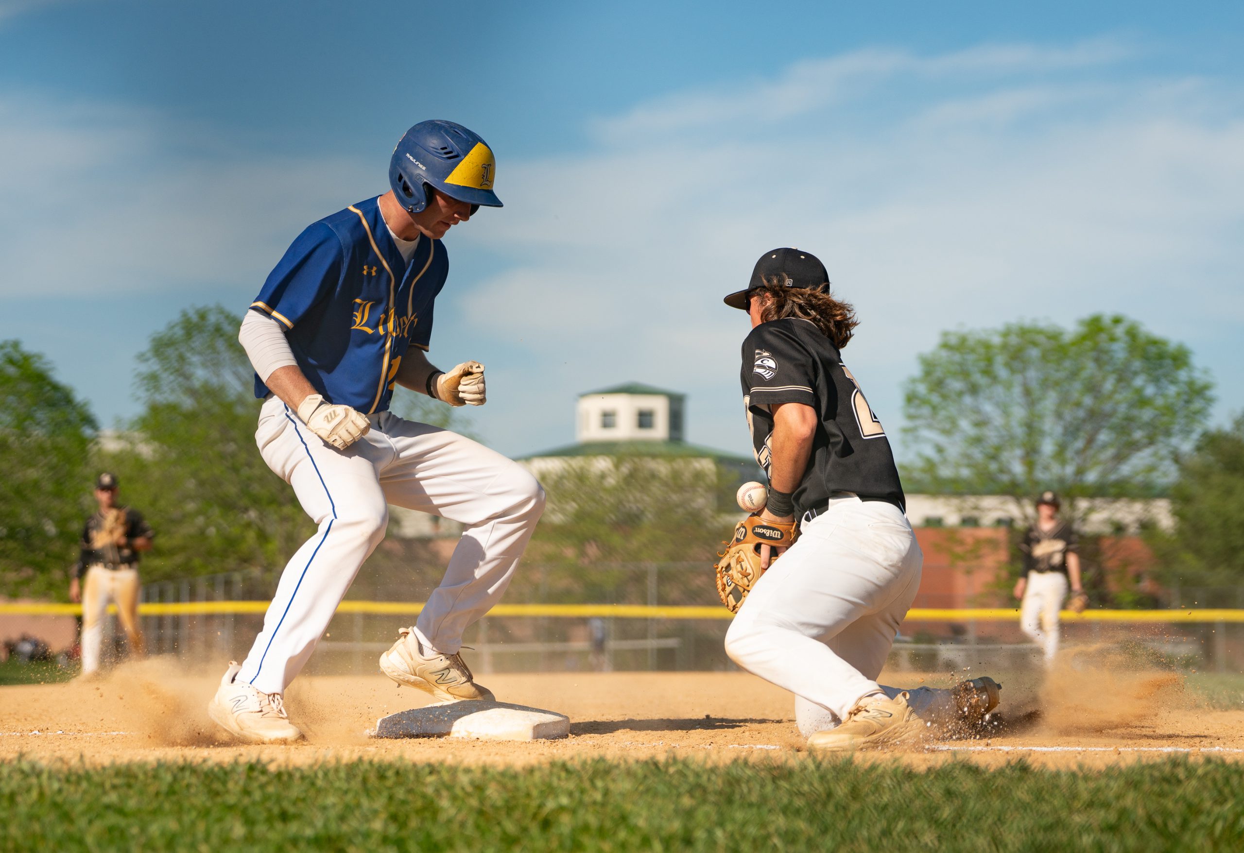 May 1, 2024 Century third baseman #28, Pierce, stops a...