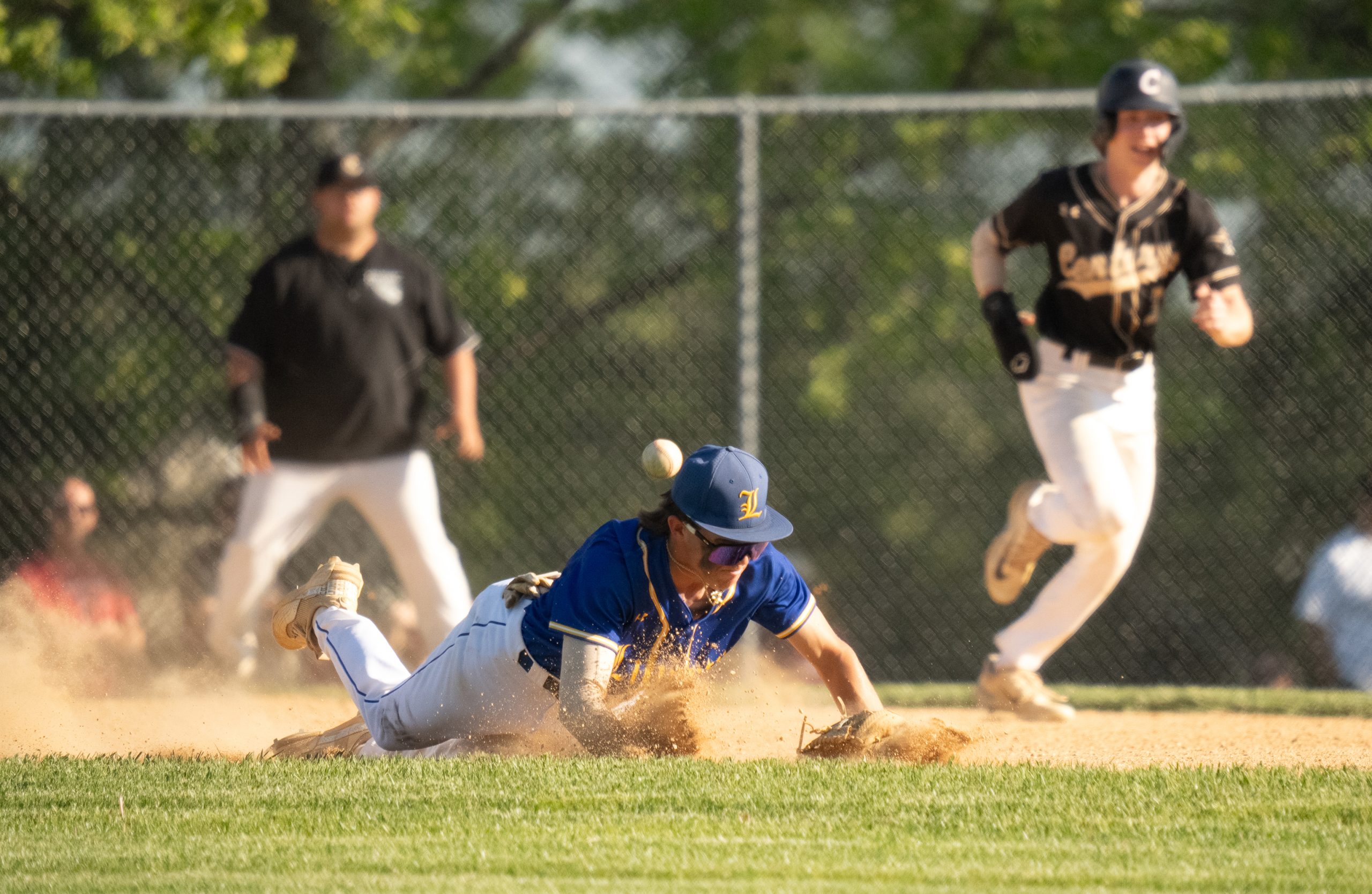 May 1, 2024 Liberty Second Baseman #3, Palle, dives for...