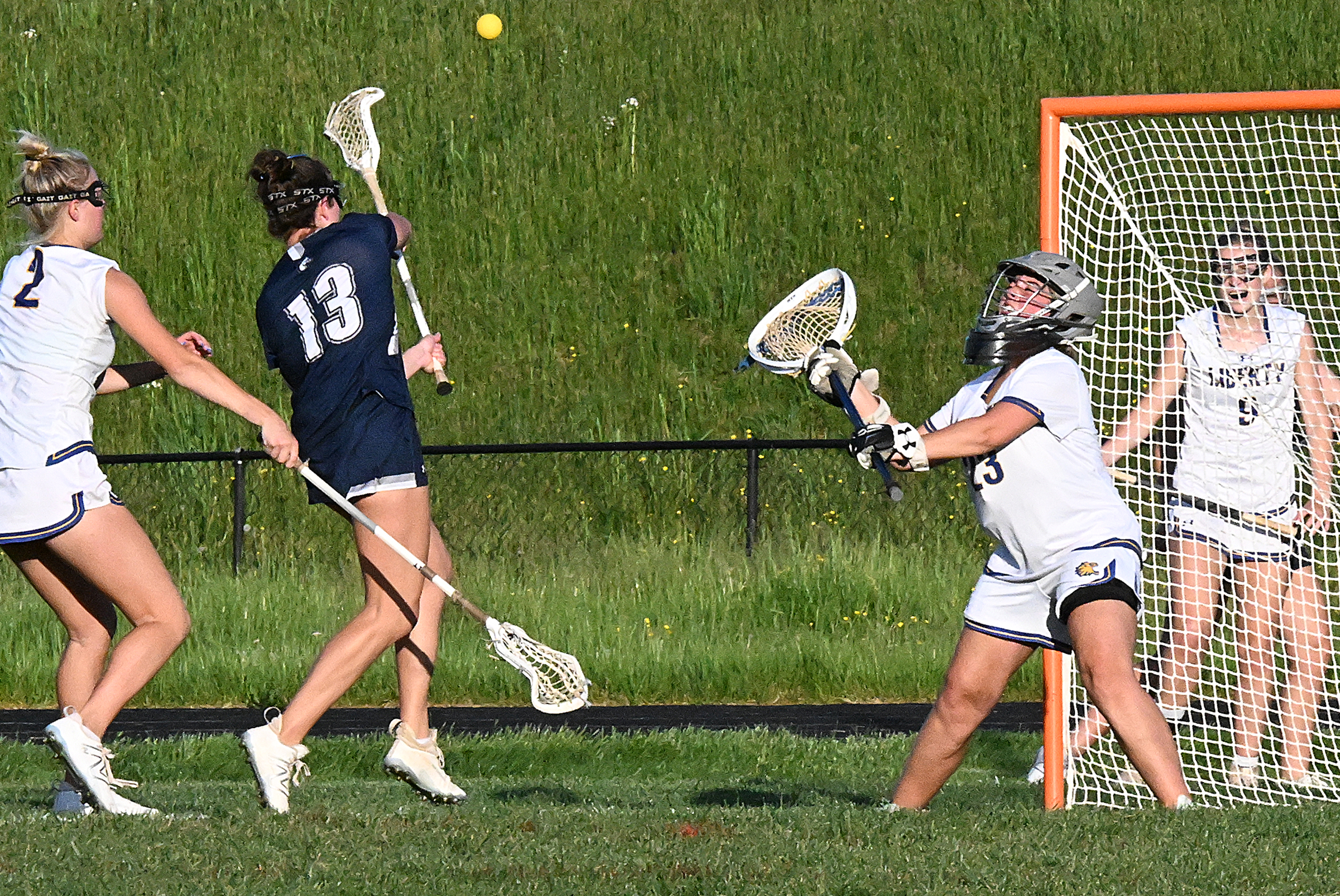 Manchester Valley's, Taylor Fique fires one past Liberty goalie Emily...