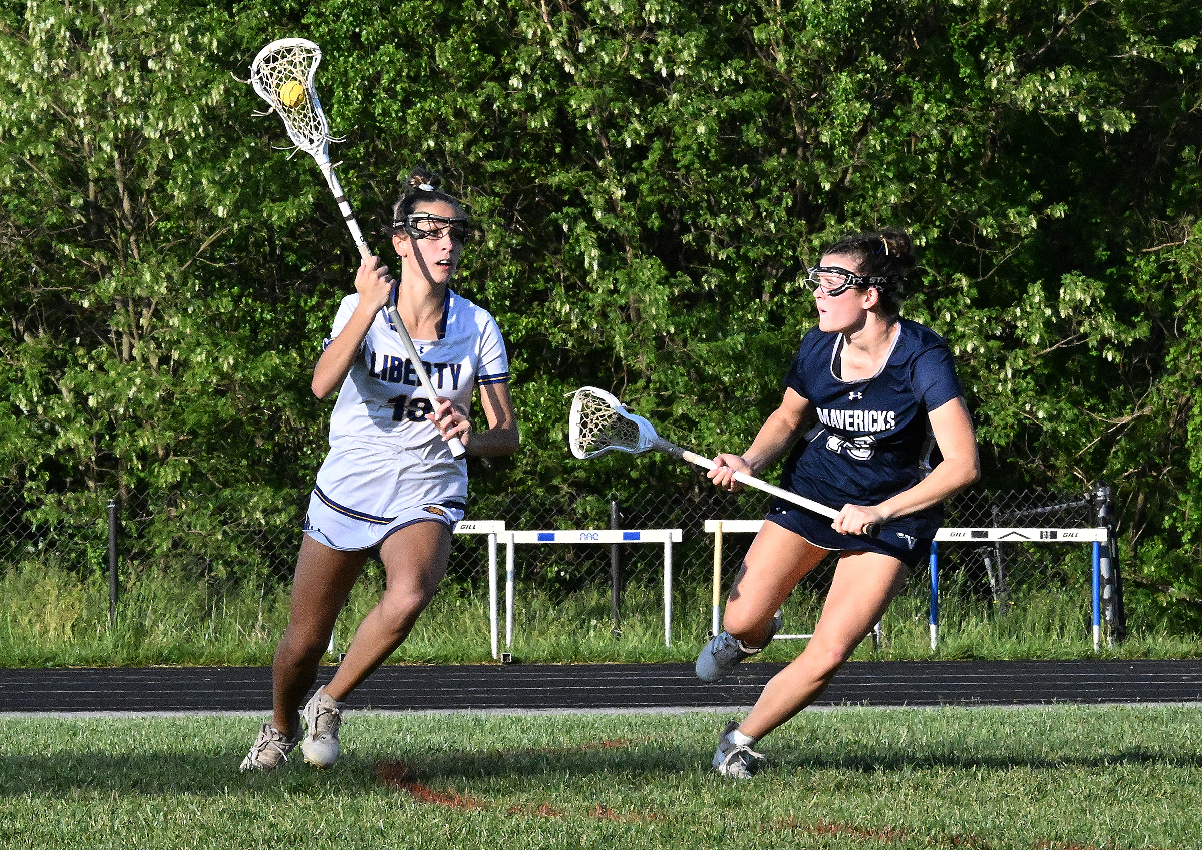 Liberty #13, Jordyn Ott, sets up a play, Manchester Valley...