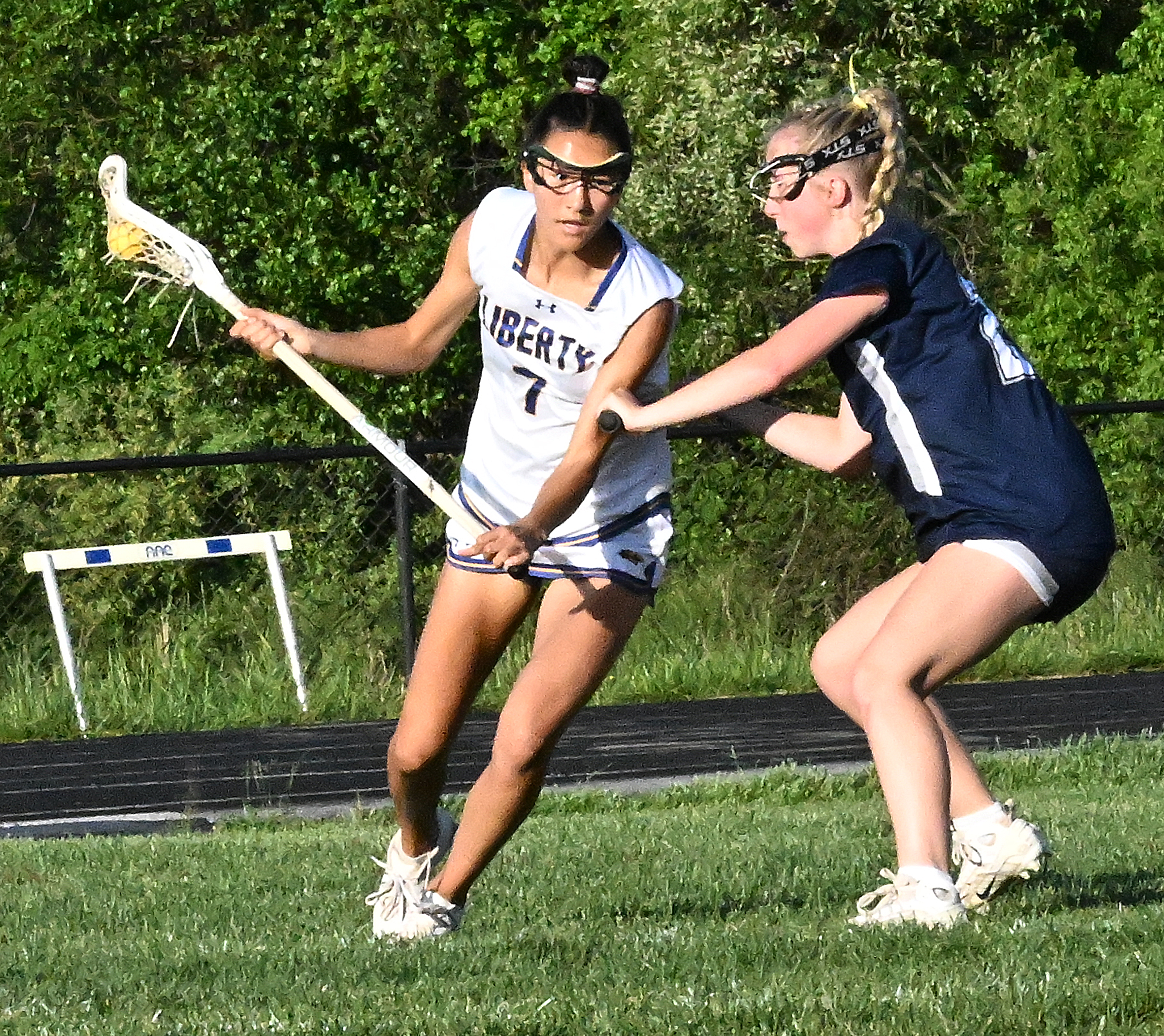 Liberty #7, Annika Wray makes a move towards the goal,...