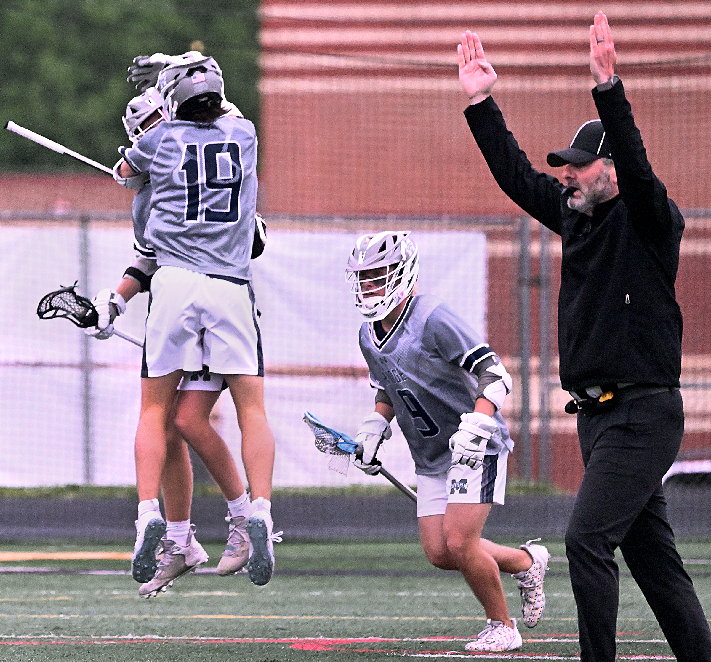 Marriotts Ridge #19, Quinn Jenkins and #22, Cooper Ellis celebrate...