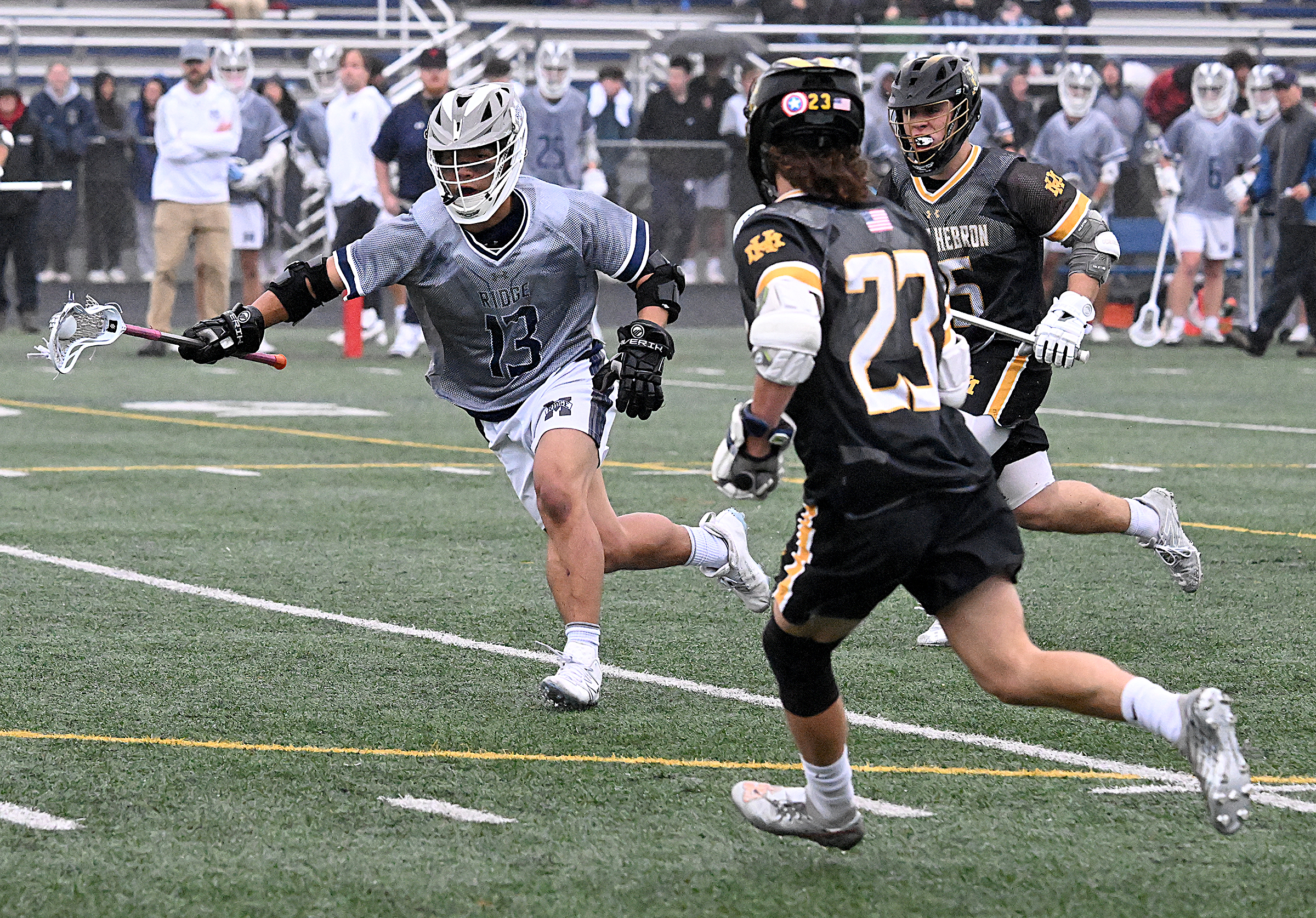 Marriotts Ridge #13 wins possession after faceoff in the 2nd...