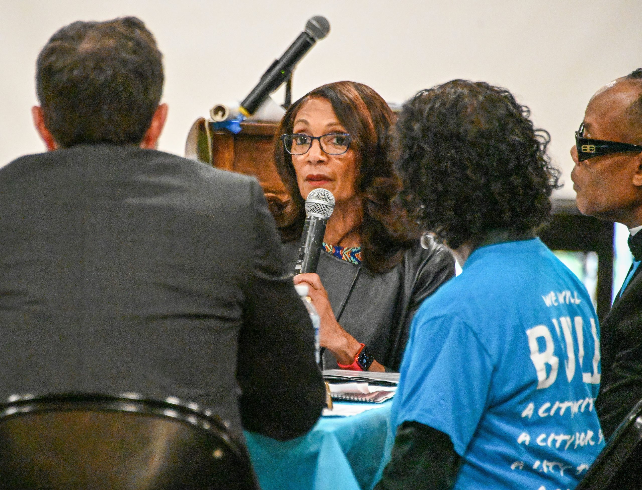 Baltimore mayoral candidate Sheila Dixon, center, participated in a mayoral...