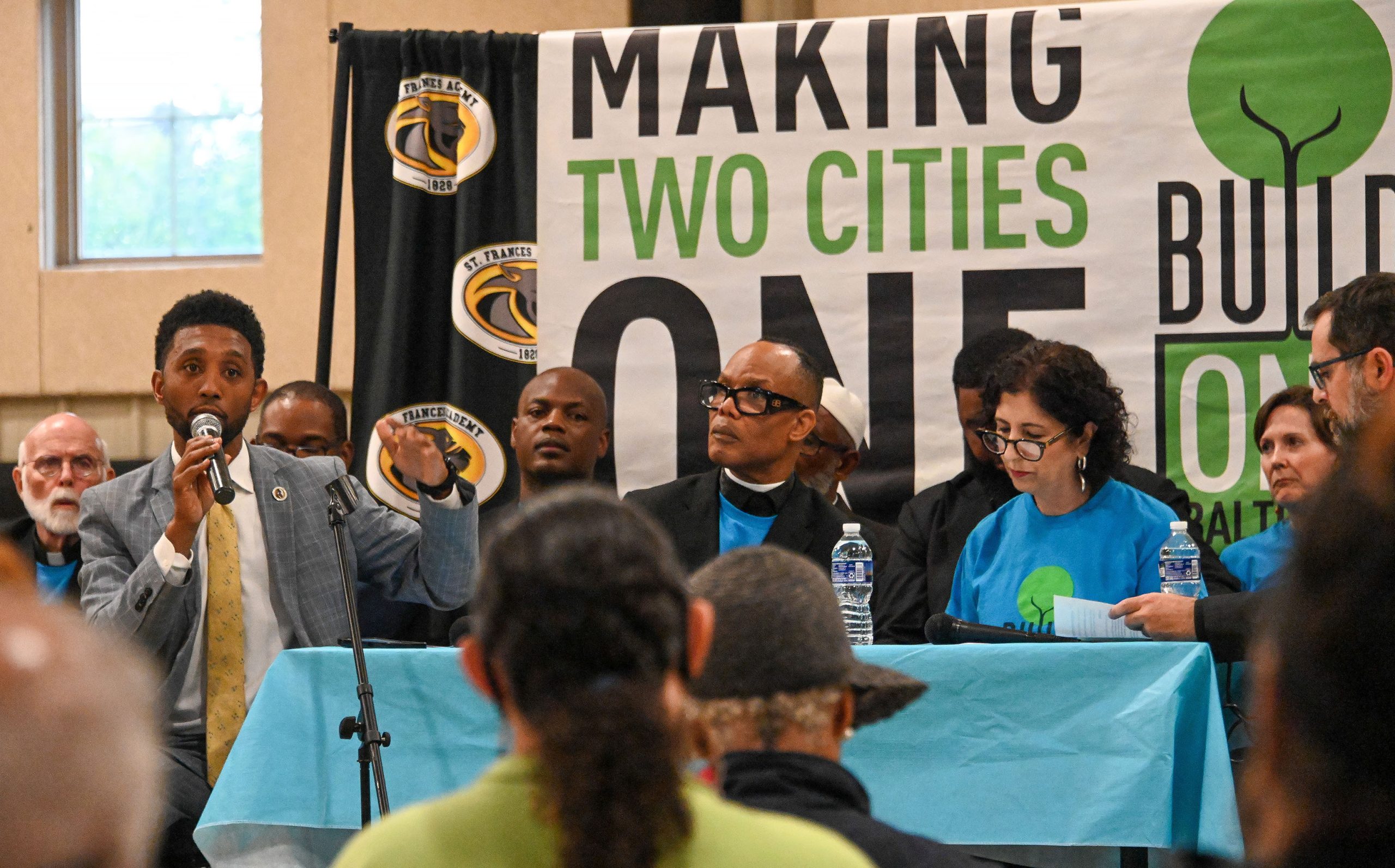 Baltimore Mayor Brandon Scott, left, participated in a mayoral race...