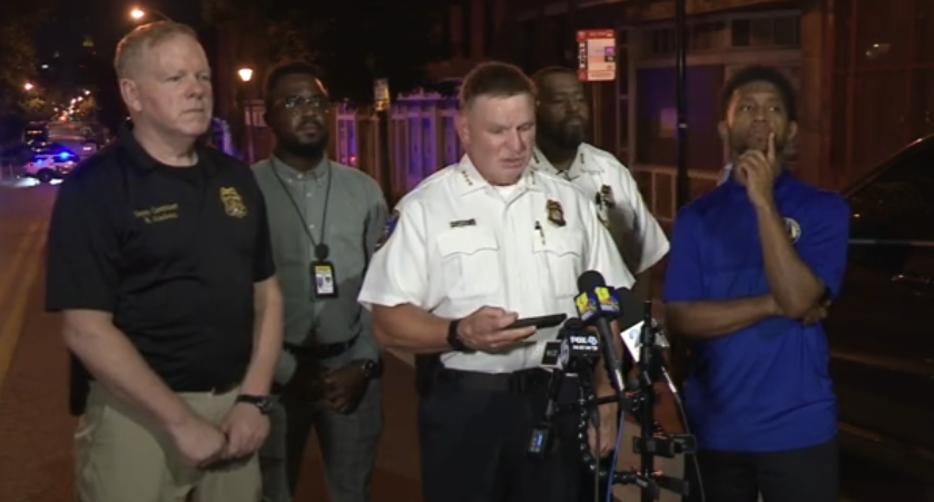 Baltimore Police Commissioner Richard Worley, center, speaks during a news...