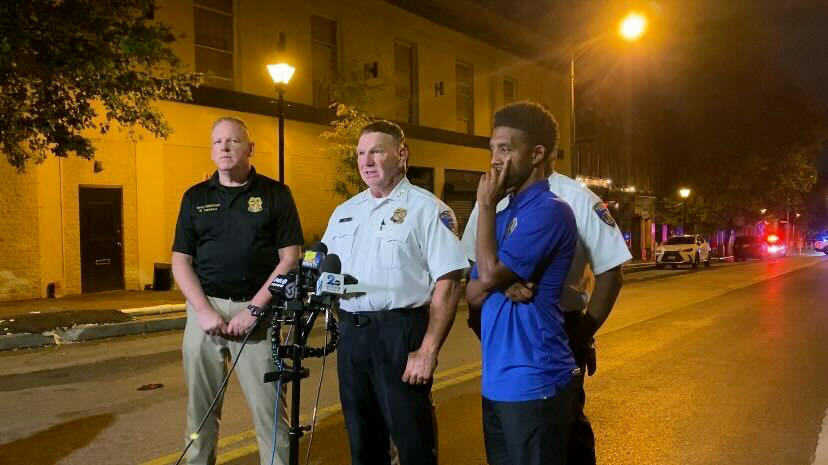 Police Commissioner Richard Worley, center, speaks about the Baltimore Police...