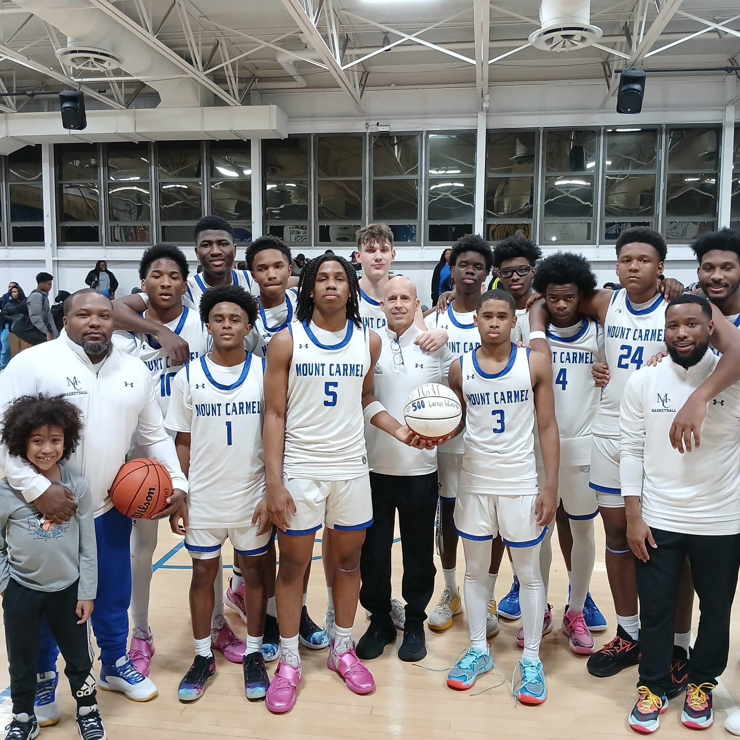 Mount Carmel basketball coach Tony Martin celebrated 23 years of...