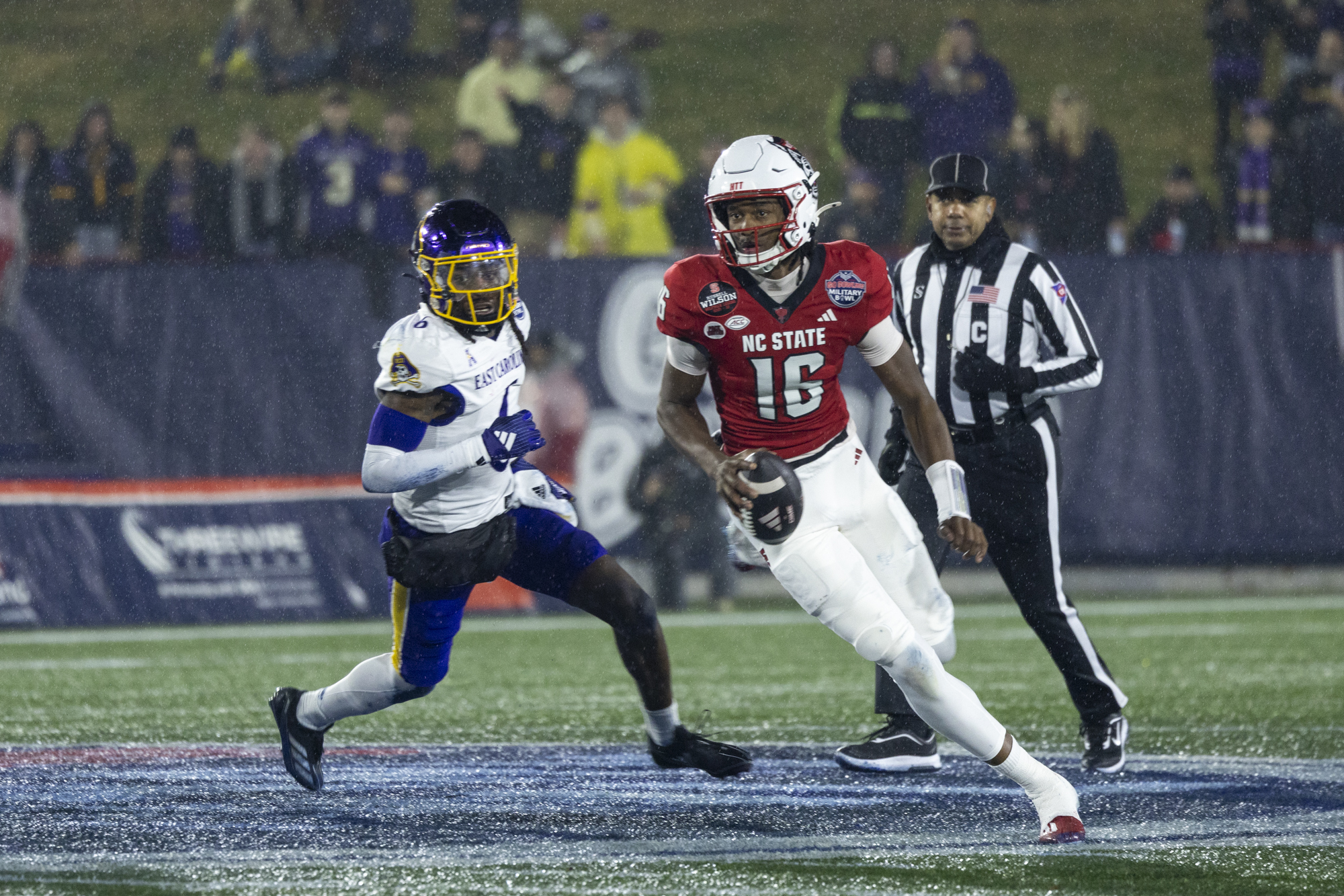 Dec. 28, 2024: North Carolina State Quarterback CJ Bailey looks...
