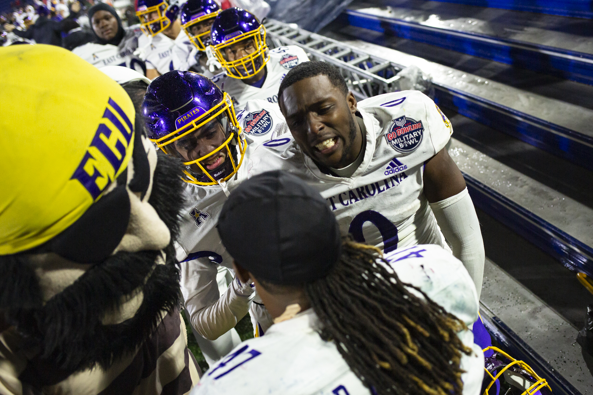 Dec. 28, 2024: East Carolina players celebrate with Rahjai Harris...