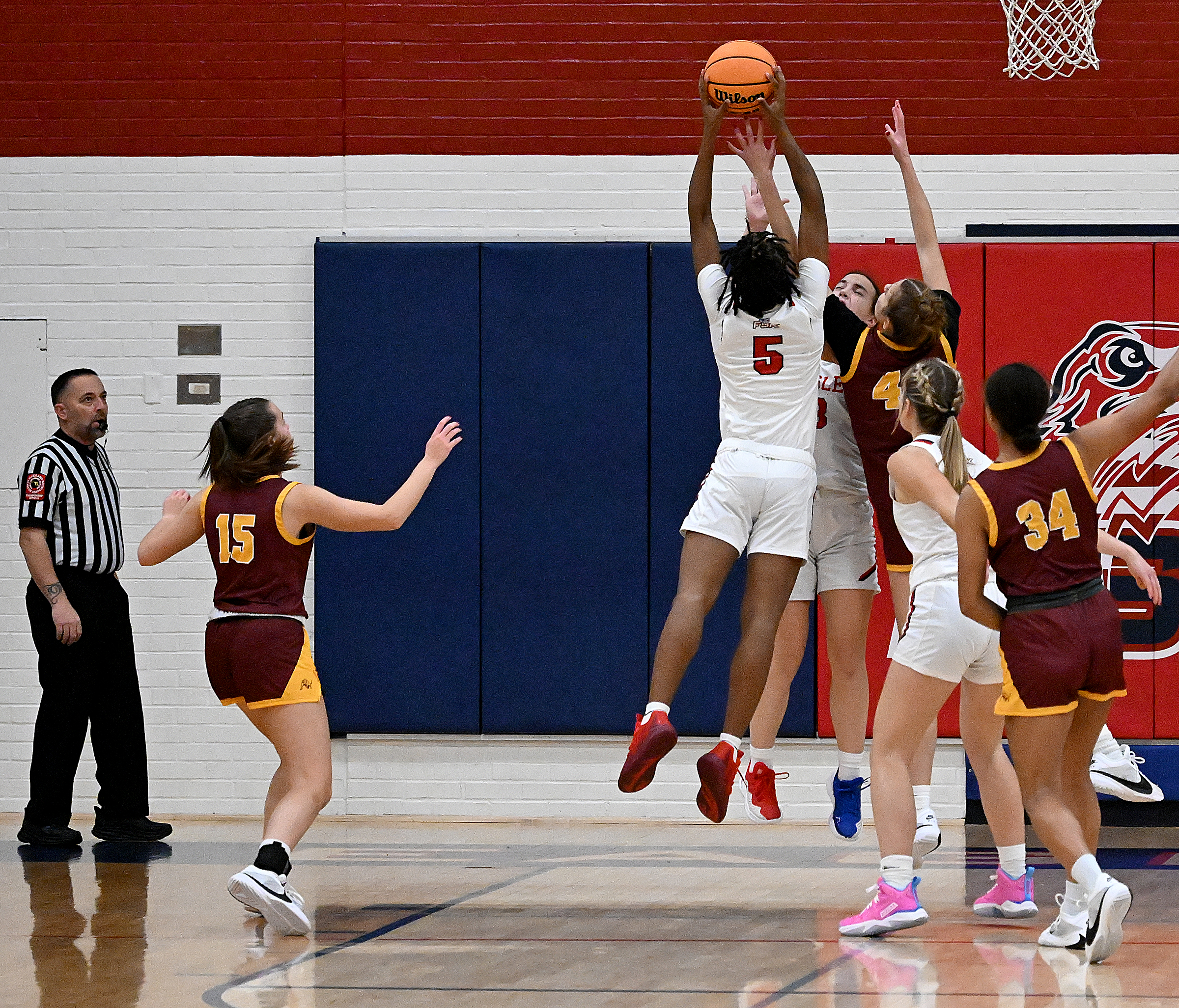 FSK #5, Jayla Watson pulls down a rebound in the...