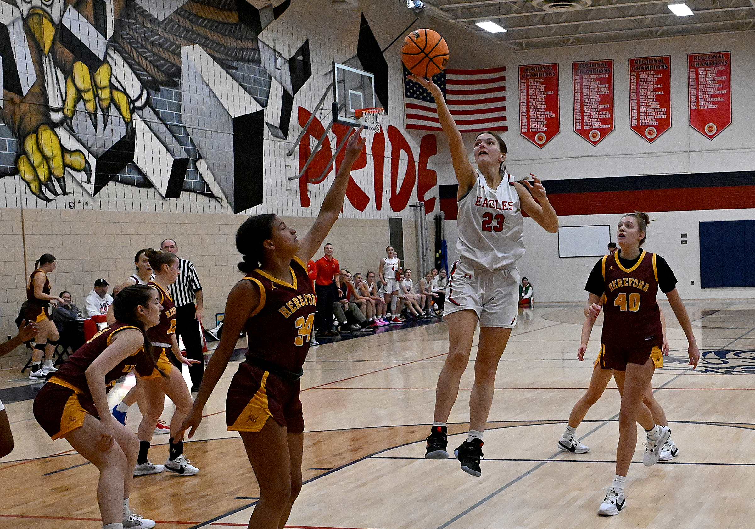 FSK #23, Caroline Kohr, splits the d, with a layup...