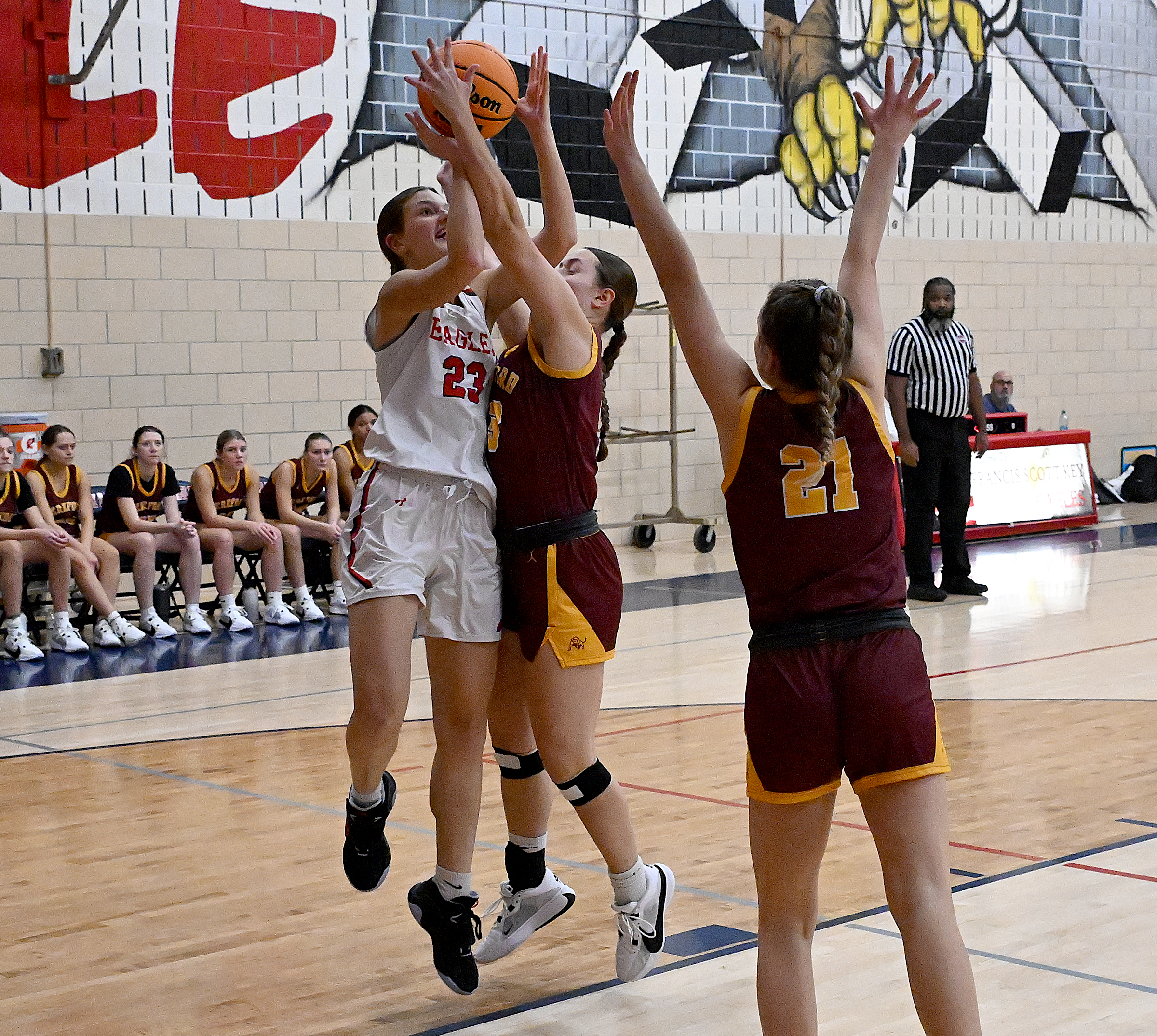 FSK #23, Caroline Kohr layup draws a foul in the...