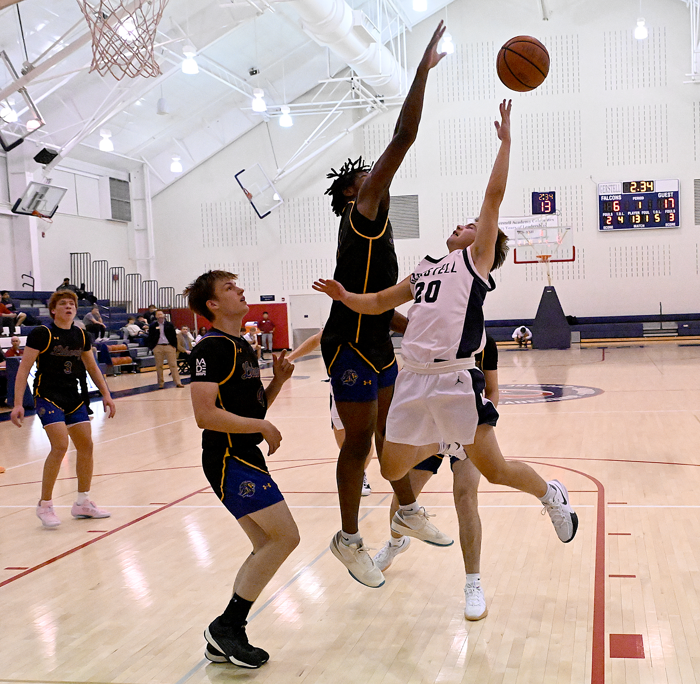 Gerstell #20, Benjamin Martin, hits a two shooting over defender...
