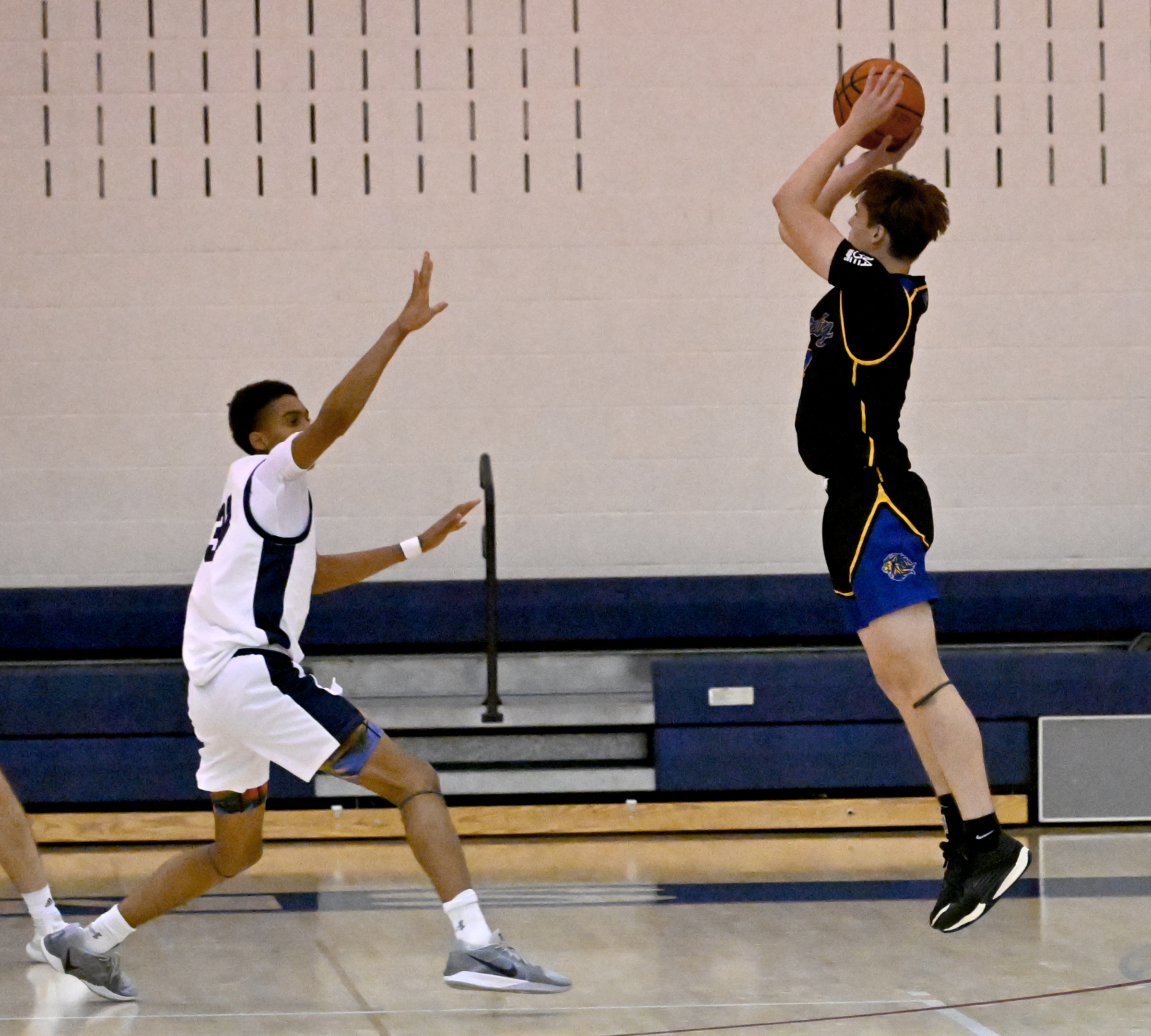 Liberty #4, Brady Berger sinks a three in the 1st...