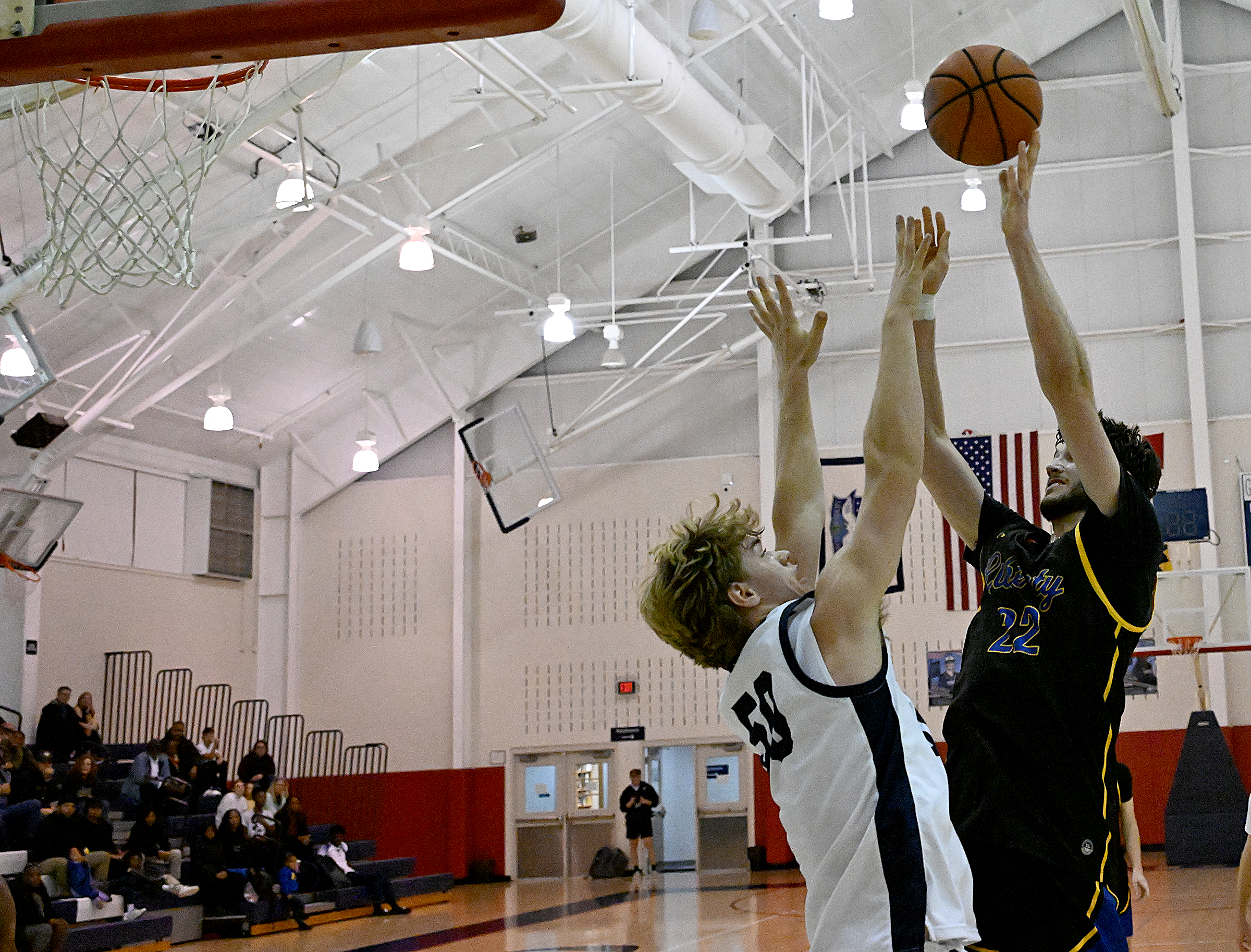 Liberty #22, Ethan Hart, put-back after rebound for two in...