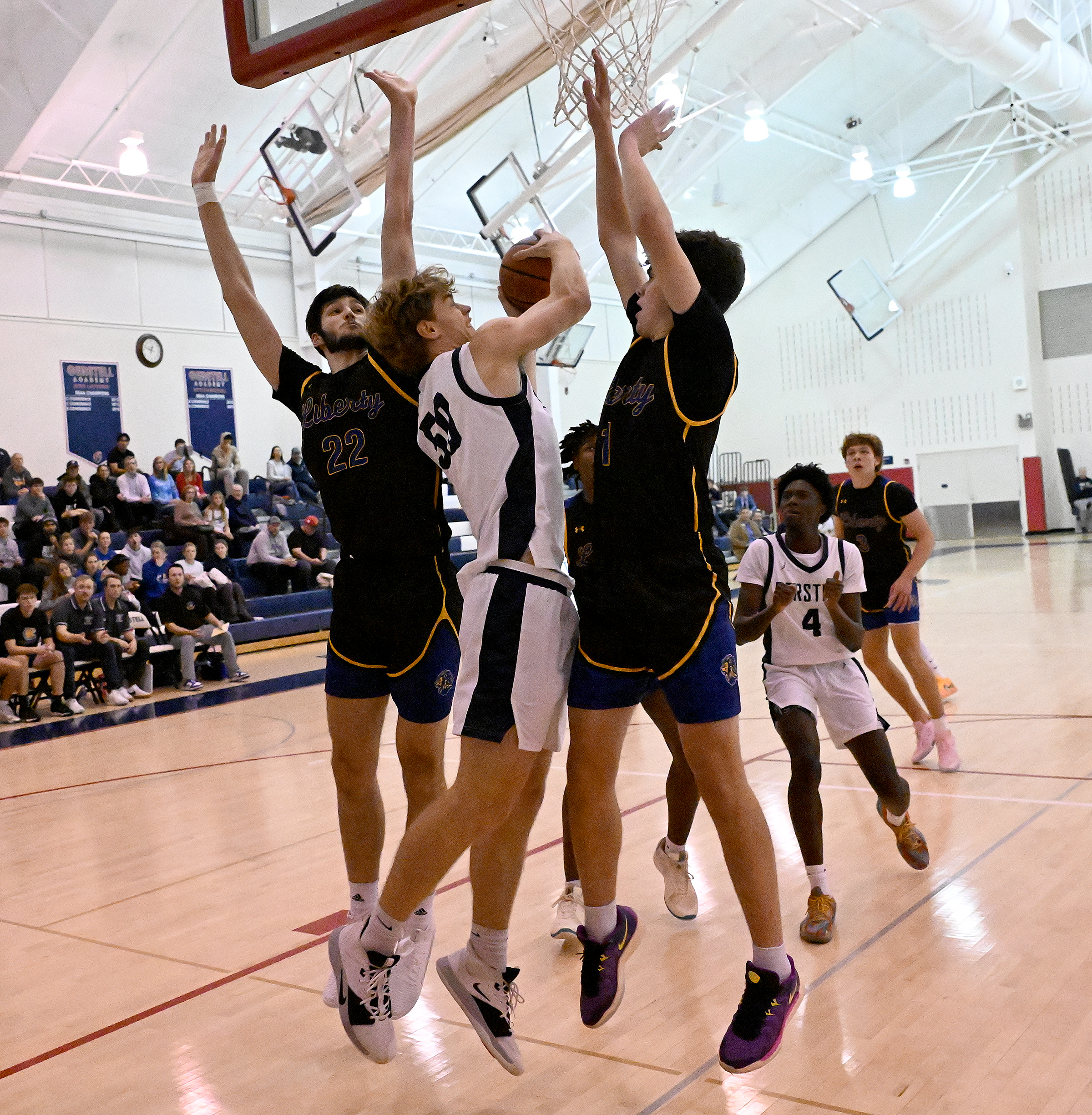 Gerstell #50, Colin Toms baseline layup draws a foul in...