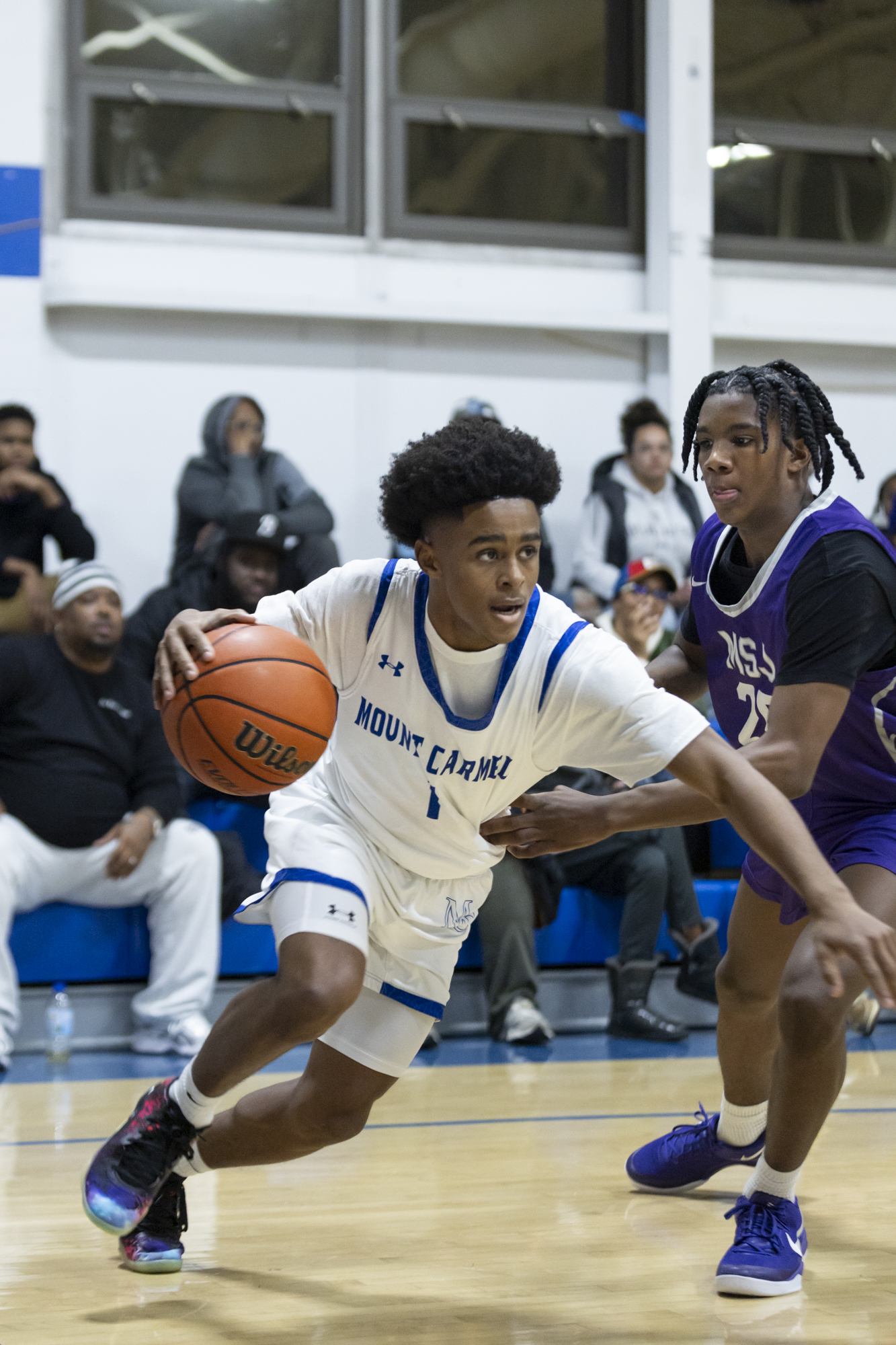 Samartine Hill drives the baseline during the game between Our...
