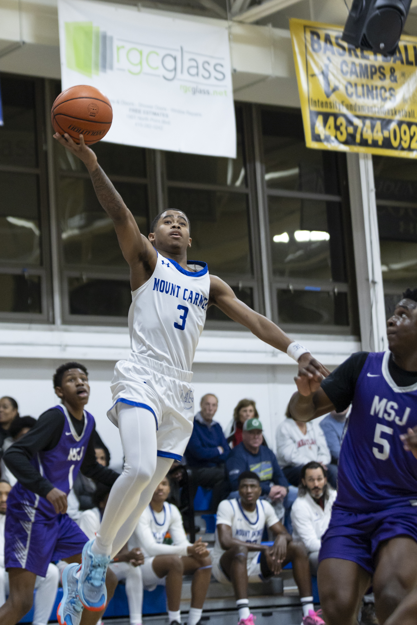Rodney Scott leaps to the basket during the game between...