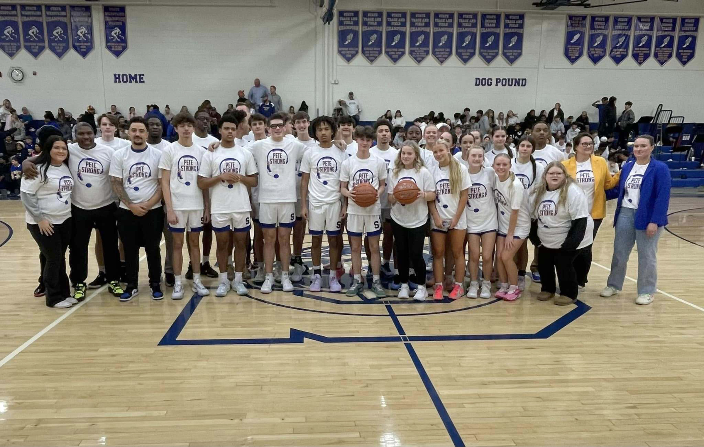 Coaches and players from the Southern High boys and girls...