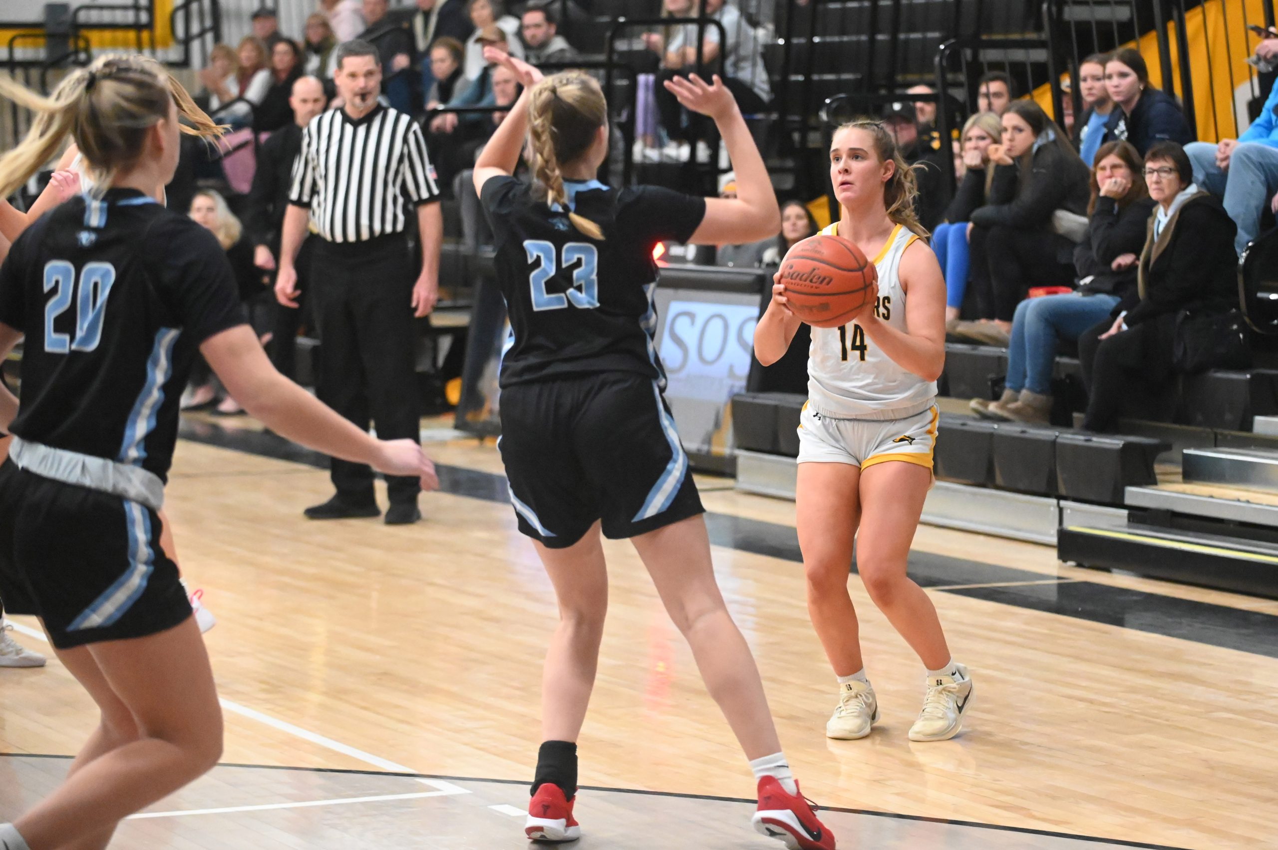 South Carroll's Charlotte Harrington takes aim at a 3-point shot...